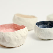 Alexandra Standen is an Australian artist who explores the potential of clay as a ceramic form; subverting the long-held association between ceramics and utilitarian function.  Standen makes things with her hands. The repetitive gesture of ‘pinching’ her hand-built forms is as much conceptual as it is an act of realisation. The conversation between materiality and form is ever evolving with intuition and experimentation in equal parts leading to the creation of these forms.