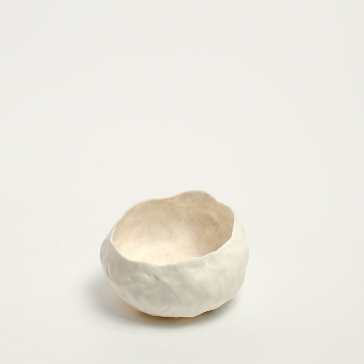 Alexandra Standen is an Australian artist who explores the potential of clay as a ceramic form; subverting the long-held association between ceramics and utilitarian function.  Standen makes things with her hands. The repetitive gesture of ‘pinching’ her hand-built forms is as much conceptual as it is an act of realisation. The conversation between materiality and form is ever evolving with intuition and experimentation in equal parts leading to the creation of these forms.