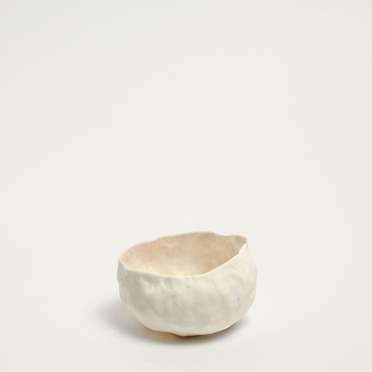 Alexandra Standen is an Australian artist who explores the potential of clay as a ceramic form; subverting the long-held association between ceramics and utilitarian function.  Standen makes things with her hands. The repetitive gesture of ‘pinching’ her hand-built forms is as much conceptual as it is an act of realisation. The conversation between materiality and form is ever evolving with intuition and experimentation in equal parts leading to the creation of these forms.