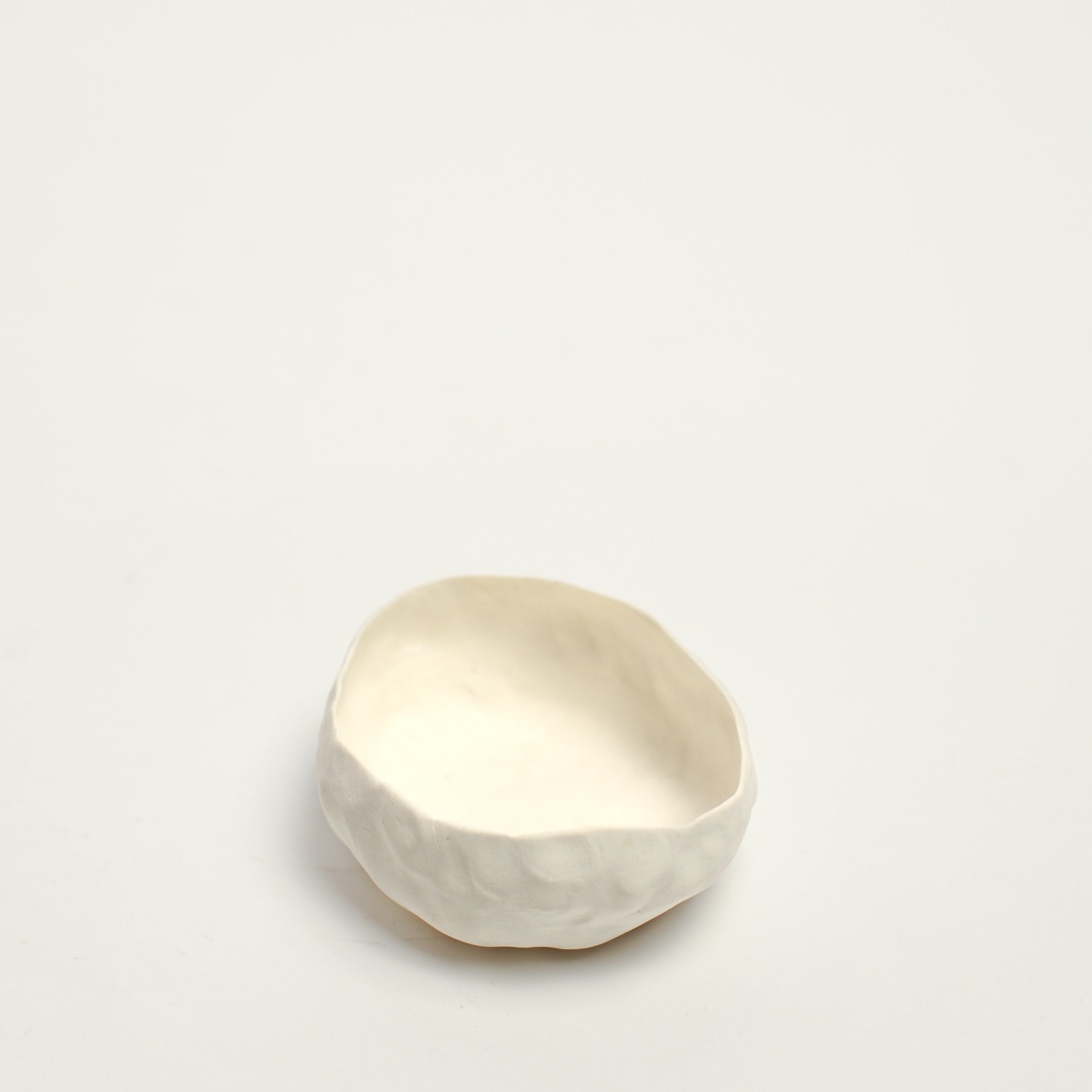 Alexandra Standen is an Australian artist who explores the potential of clay as a ceramic form; subverting the long-held association between ceramics and utilitarian function.  Standen makes things with her hands. The repetitive gesture of ‘pinching’ her hand-built forms is as much conceptual as it is an act of realisation. The conversation between materiality and form is ever evolving with intuition and experimentation in equal parts leading to the creation of these forms.