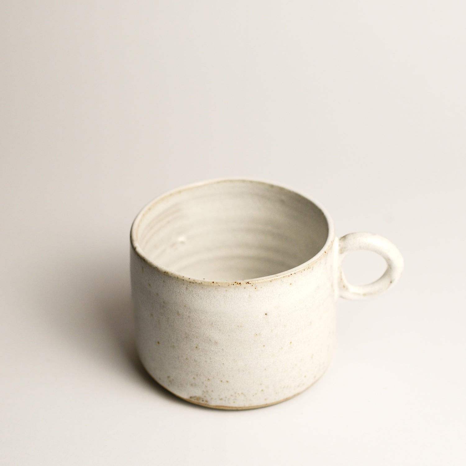 ALICIA MCVILLY is a Ceramic artist from Melbourne. She places value on simplicity and functionality of form as well as sustainability and connection. Alicia hopes her work encourages the coming together, enjoying and sharing a meal with family and community and allowing a feeling of space and calm in our busy world. Each piece is thoughtfully wheel thrown in her North Fitzroy studio.