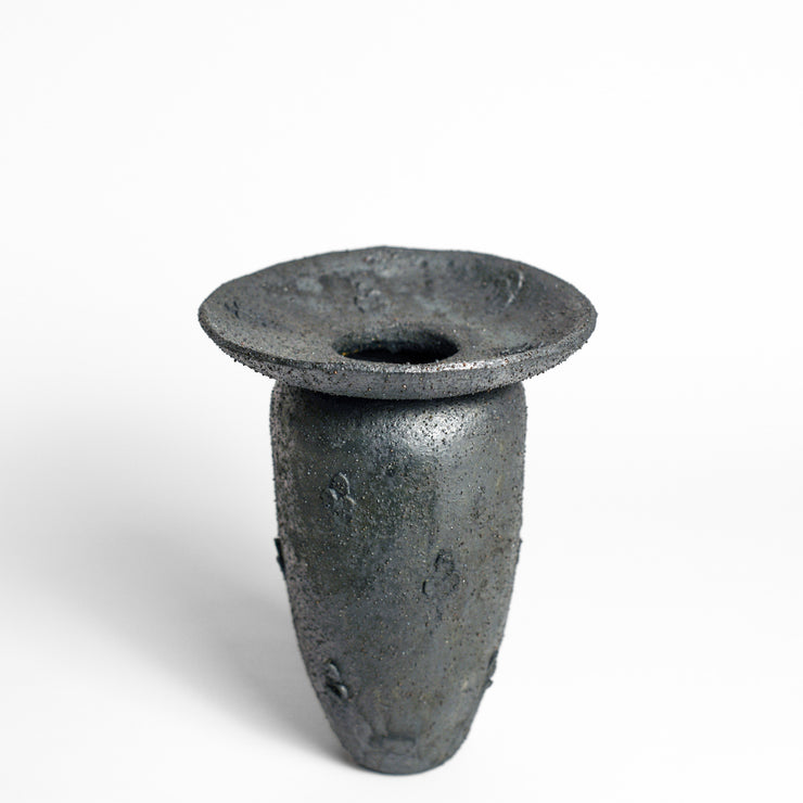 Ceramic vessel handmade by Hana Vasak from Dasa Ceramics using handbuilding and carving techniques. Hana is an Australian ceramicist based in Melbourne where she creates contemporary ceramics using handbuilding techniques and playing with texture.