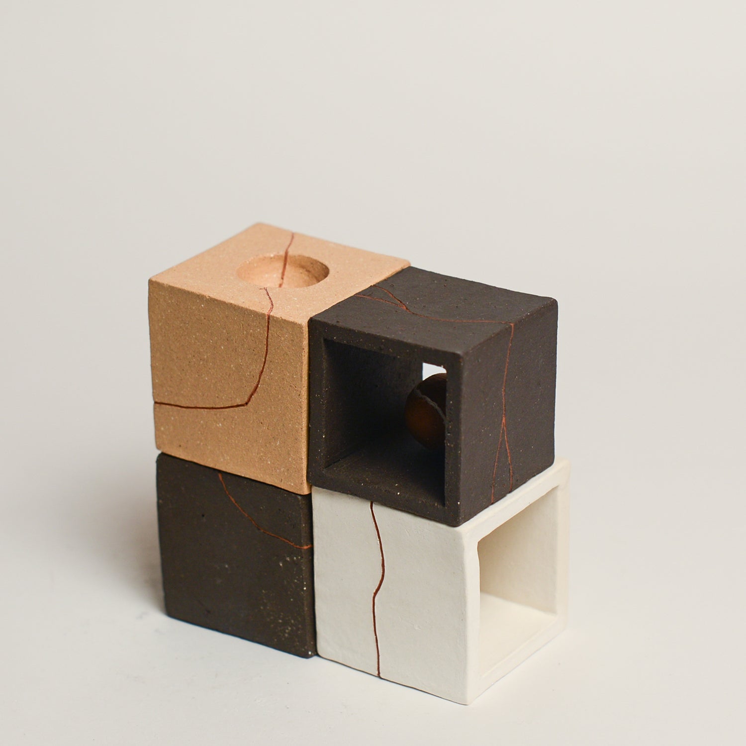 Ceramic sculpture handmade by Sydney-based artist Debbey Watson. The minimal aesthetic of Debbey’s enclosed, slab-built geometric forms and contemporary ceramics is inspired by her interest in modern architecture and design. 