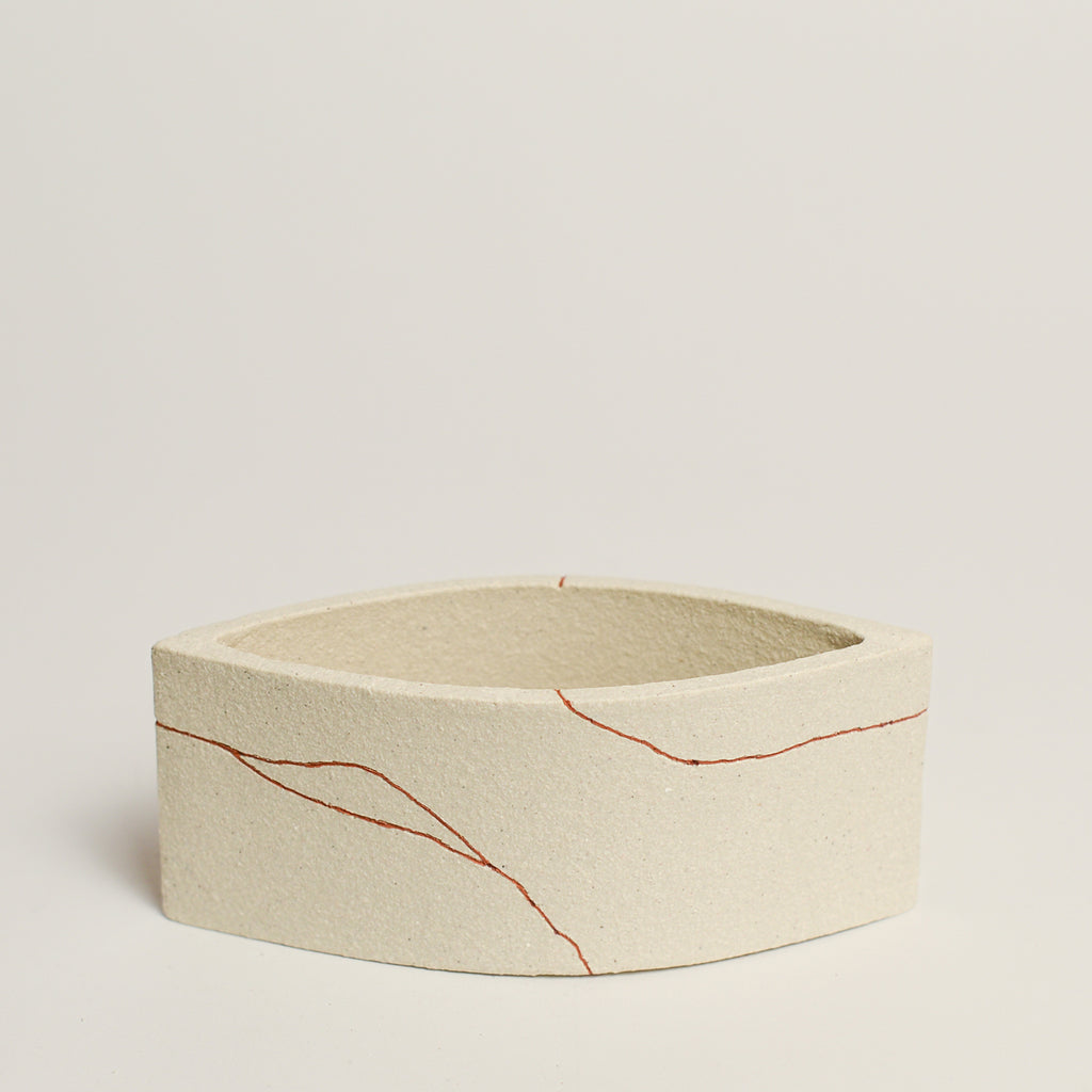 Ceramic sculpture handmade by Sydney-based artist Debbey Watson. The minimal aesthetic of Debbey’s enclosed, slab-built geometric forms and contemporary ceramics is inspired by her interest in modern architecture and design. 
