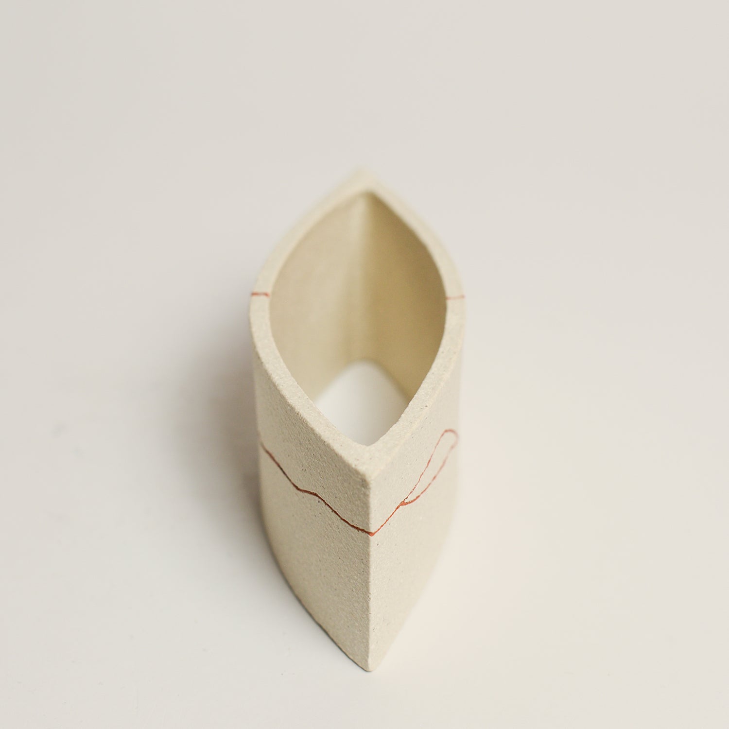 Ceramic sculpture handmade by Sydney-based artist Debbey Watson. The minimal aesthetic of Debbey’s enclosed, slab-built geometric forms and contemporary ceramics is inspired by her interest in modern architecture and design. 