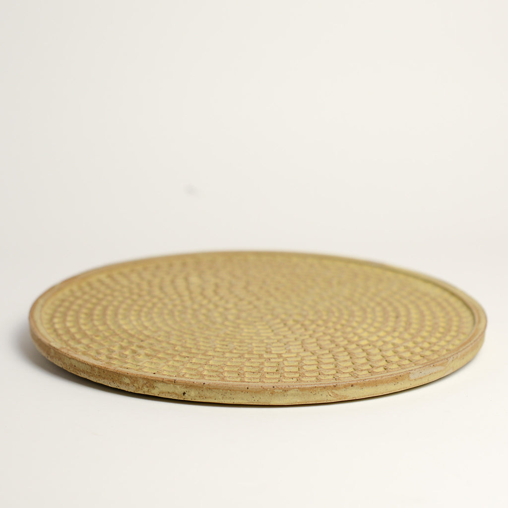 Ceramic whiskey cup handmade by Melbourne based maker eb Ceramics. This piece is part of an exclusive range created especially for pépite - all pieces were hand thrown by eb and later hand carved in a unique pattern inspired by French cobblestone roads and finished with one of three signature glaze recipes.