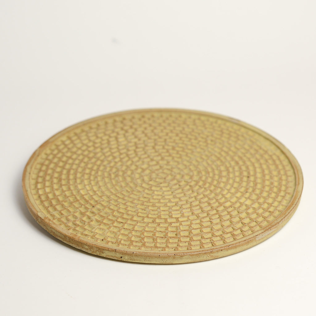 Ceramic whiskey cup handmade by Melbourne based maker eb Ceramics. This piece is part of an exclusive range created especially for pépite - all pieces were hand thrown by eb and later hand carved in a unique pattern inspired by French cobblestone roads and finished with one of three signature glaze recipes.