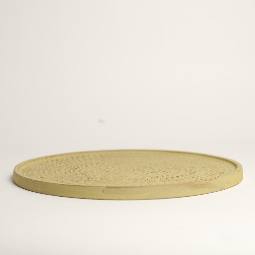 Ceramic whiskey cup handmade by Melbourne based maker eb Ceramics. This piece is part of an exclusive range created especially for pépite - all pieces were hand thrown by eb and later hand carved in a unique pattern inspired by French cobblestone roads and finished with one of three signature glaze recipes.