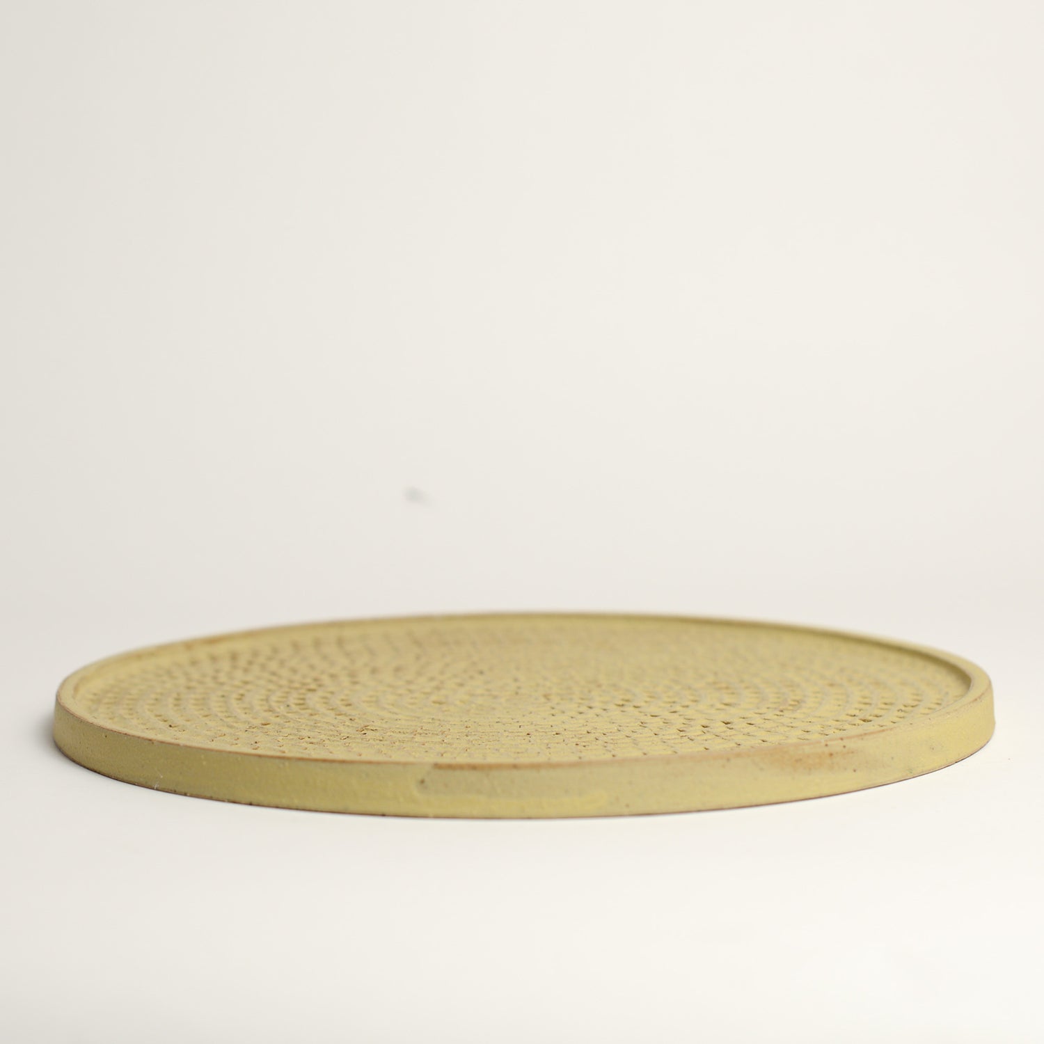 Ceramic whiskey cup handmade by Melbourne based maker eb Ceramics. This piece is part of an exclusive range created especially for pépite - all pieces were hand thrown by eb and later hand carved in a unique pattern inspired by French cobblestone roads and finished with one of three signature glaze recipes.