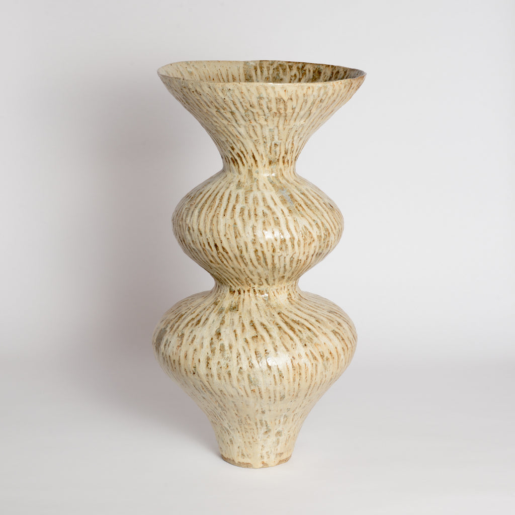 Carved Celestial Wobble Vase