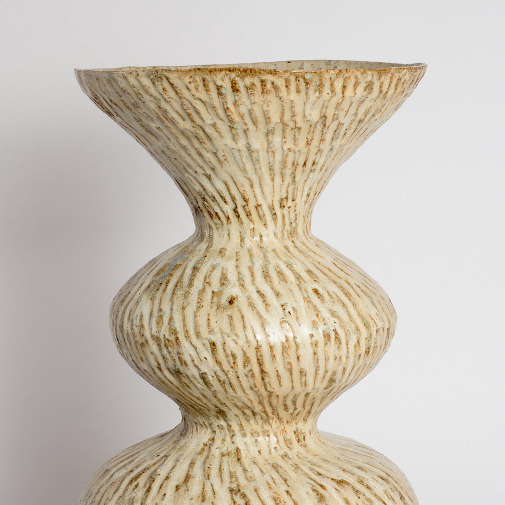 Carved Celestial Wobble Vase