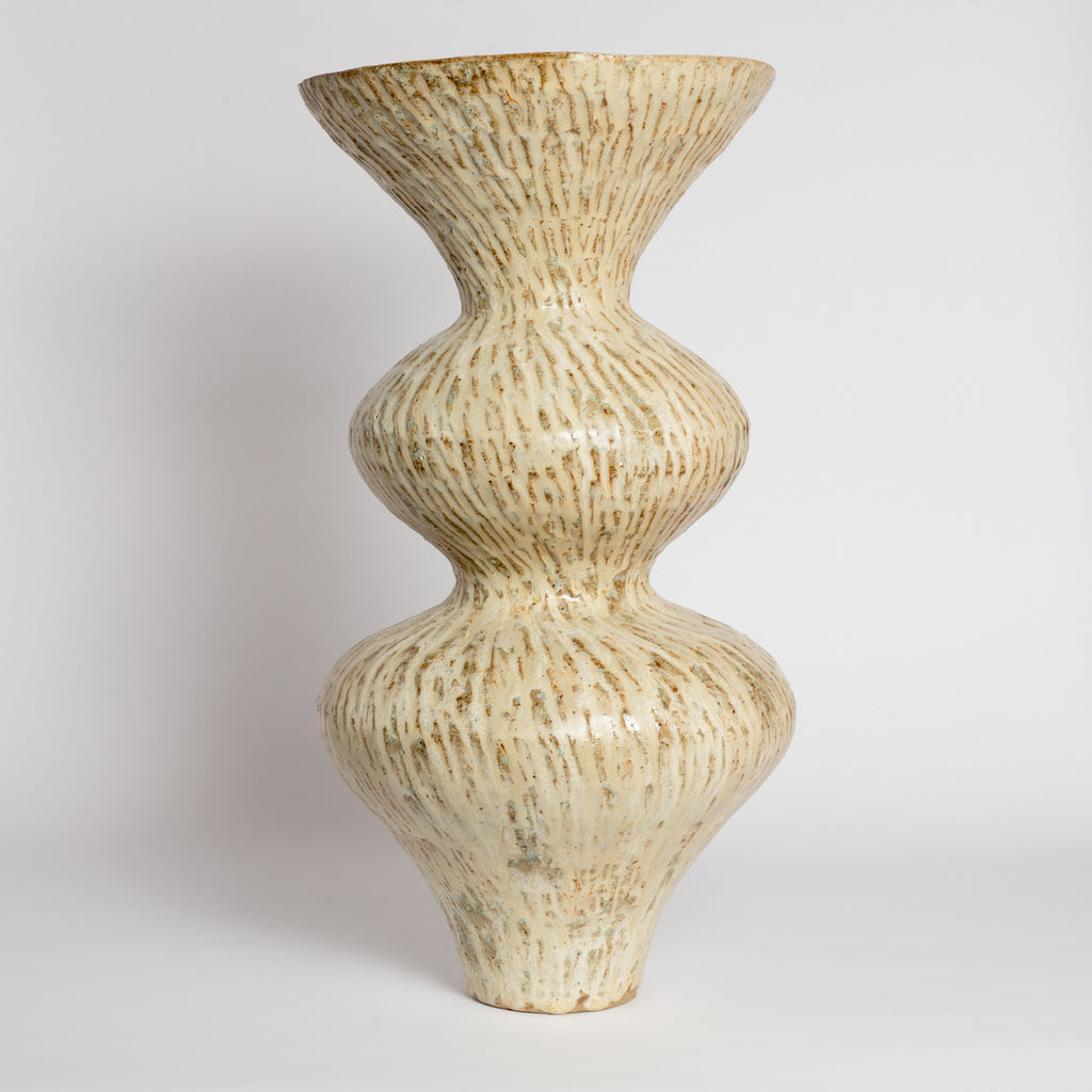 Carved Celestial Wobble Vase