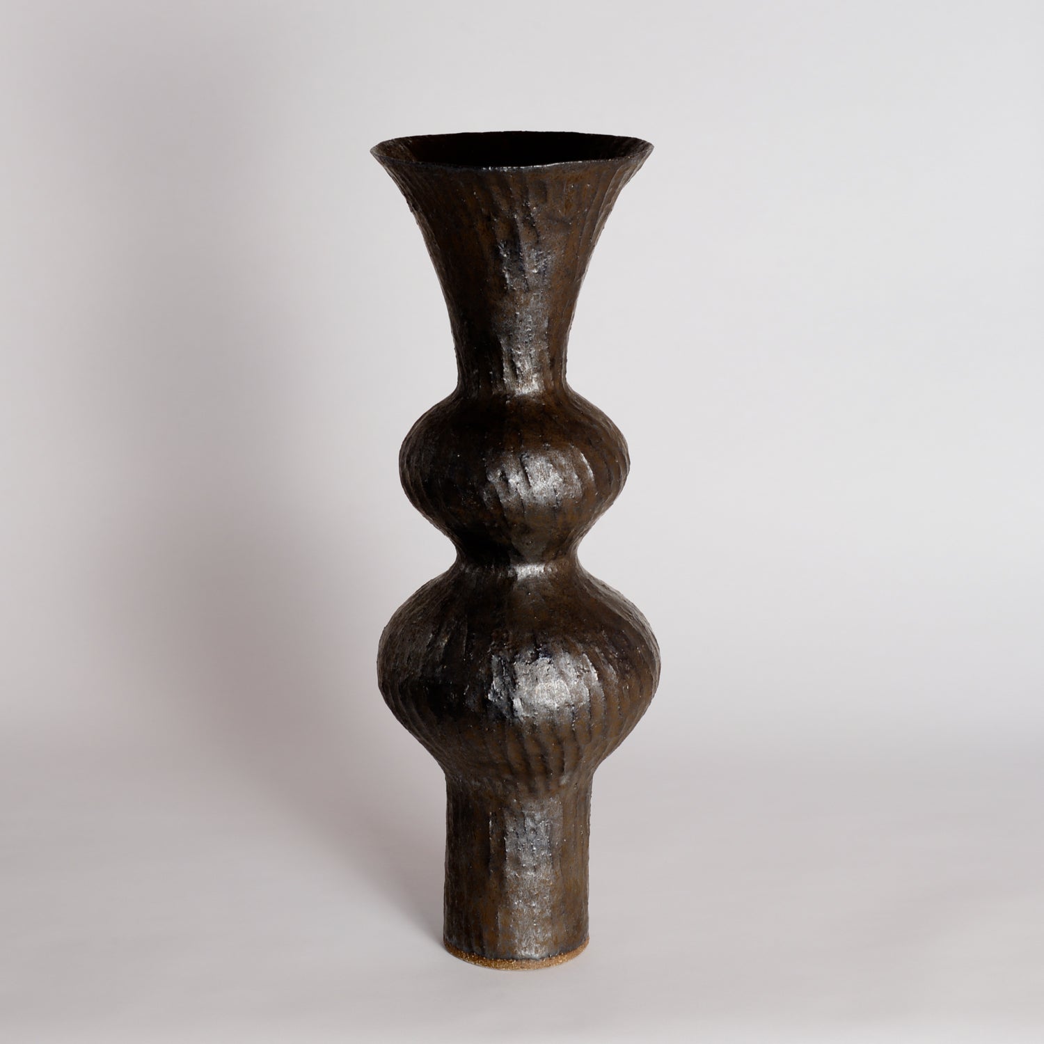 Carved Bronze Wobble Vessel