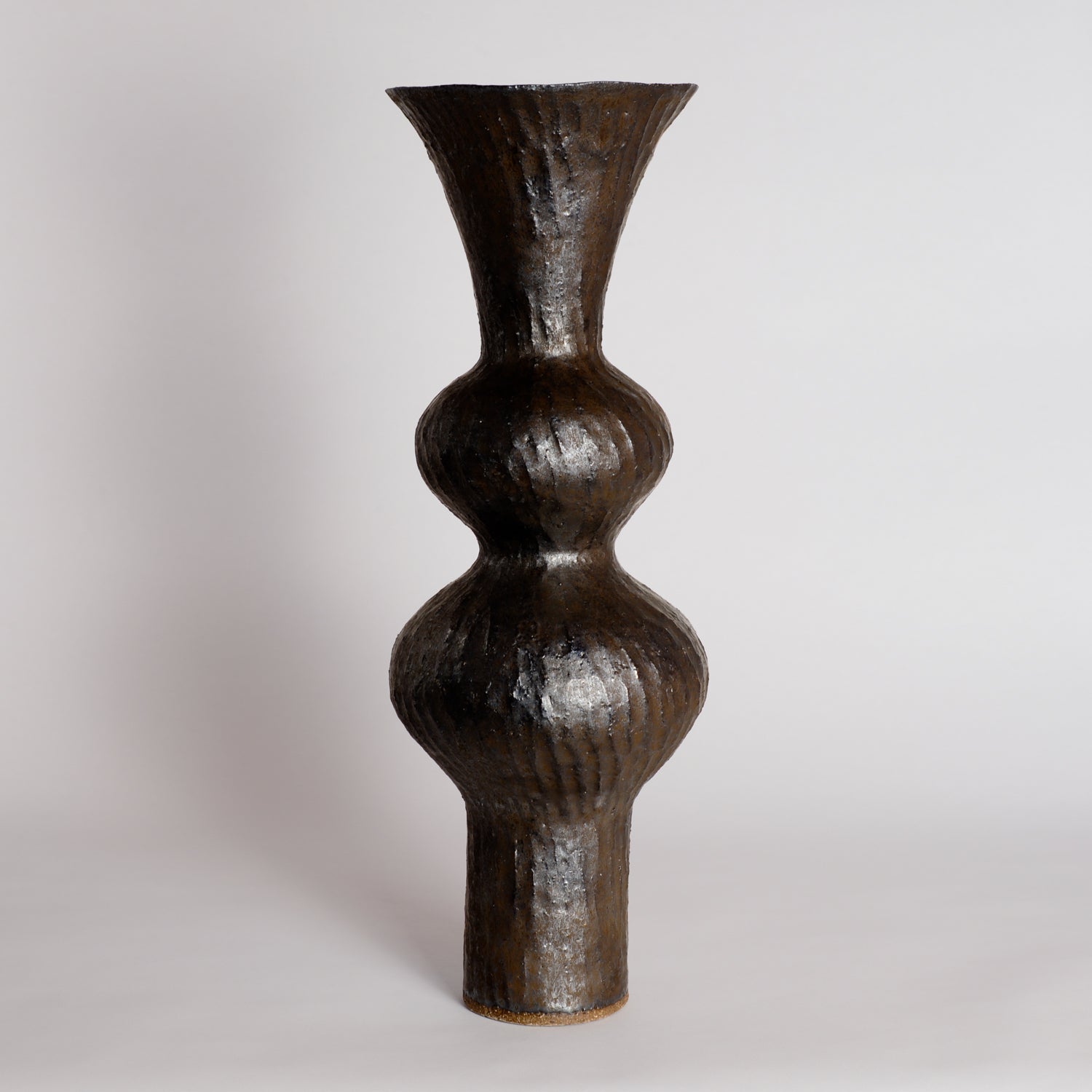 Carved Bronze Wobble Vessel