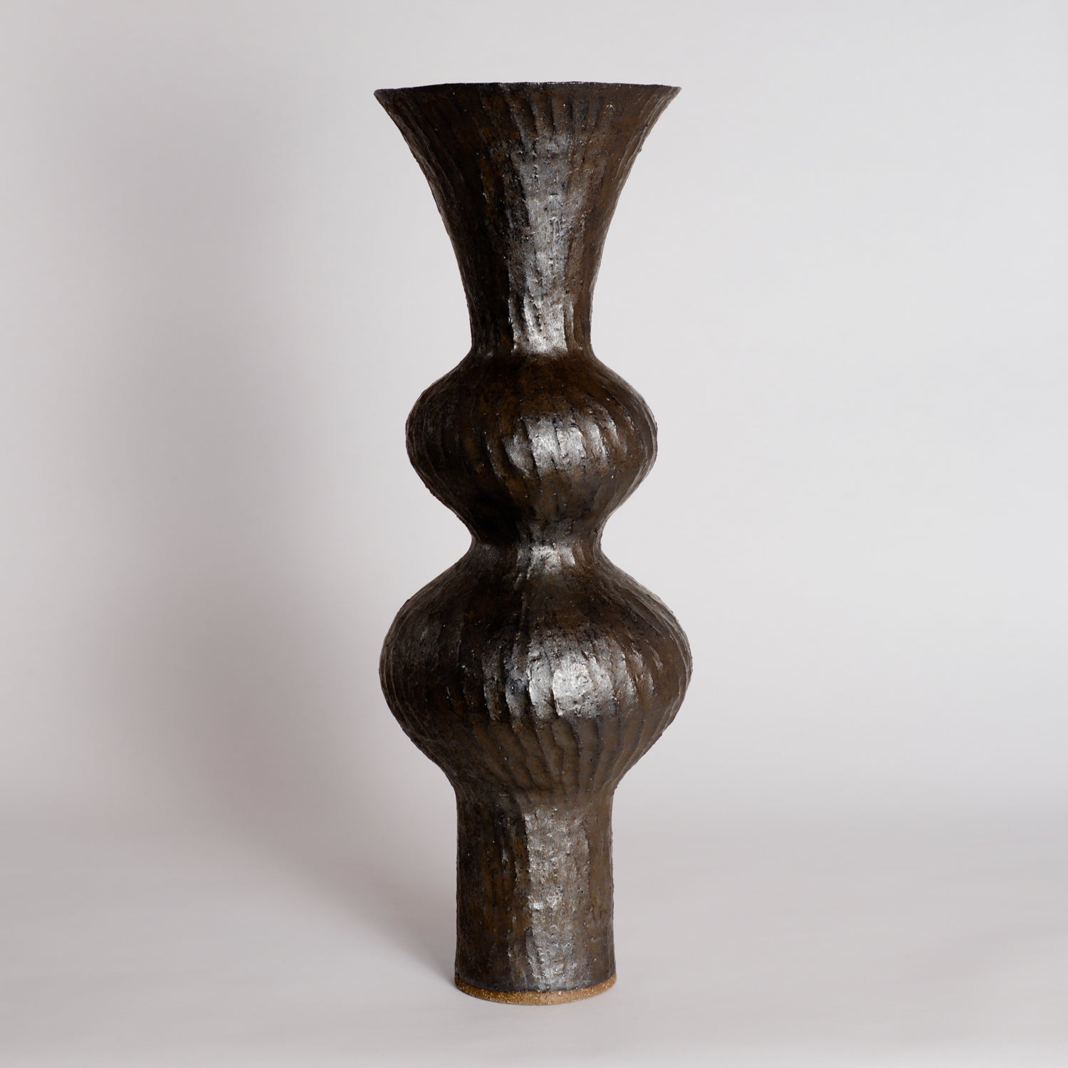 Carved Bronze Wobble Vessel