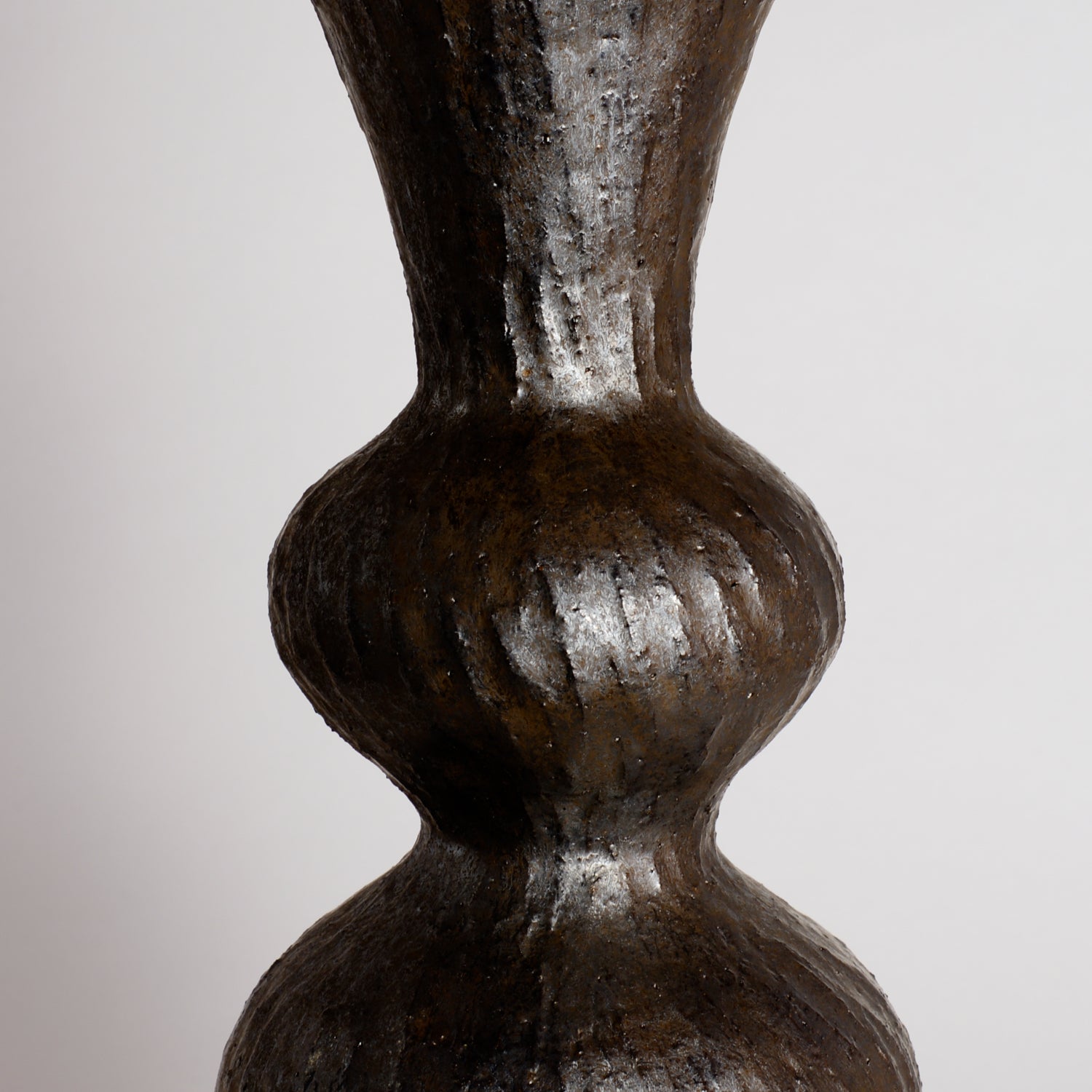 Carved Bronze Wobble Vessel