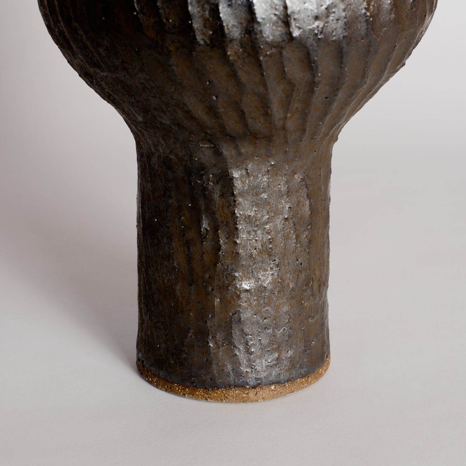 Carved Bronze Wobble Vessel