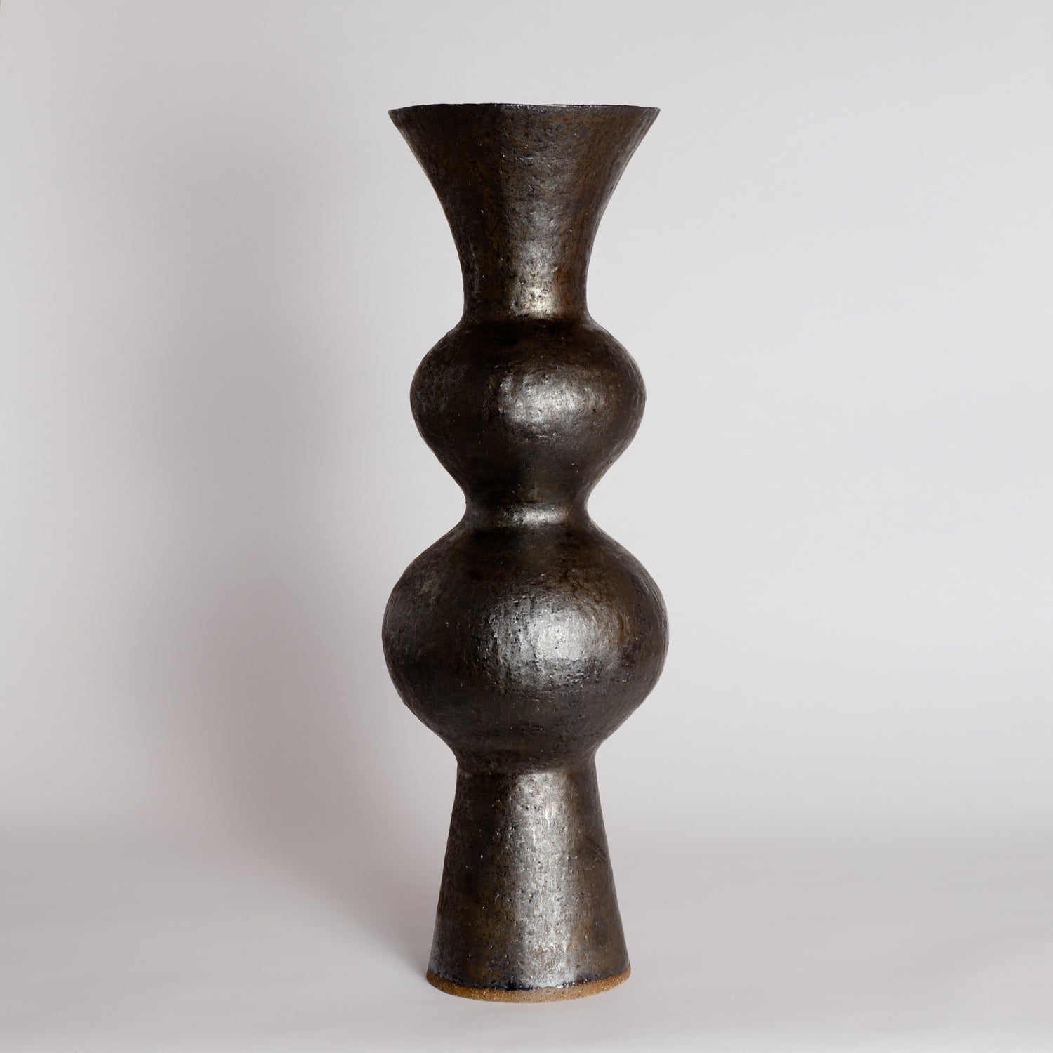 Tall Smooth Bronze Wobble Vessel