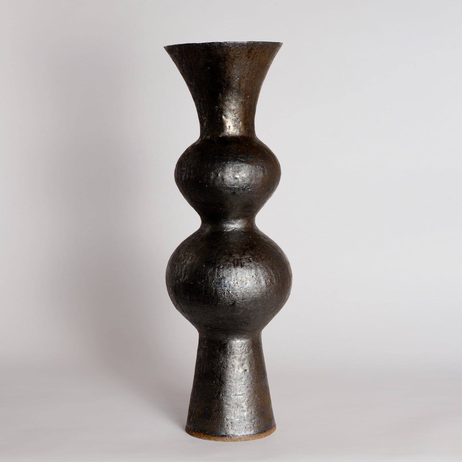 Tall Smooth Bronze Wobble Vessel