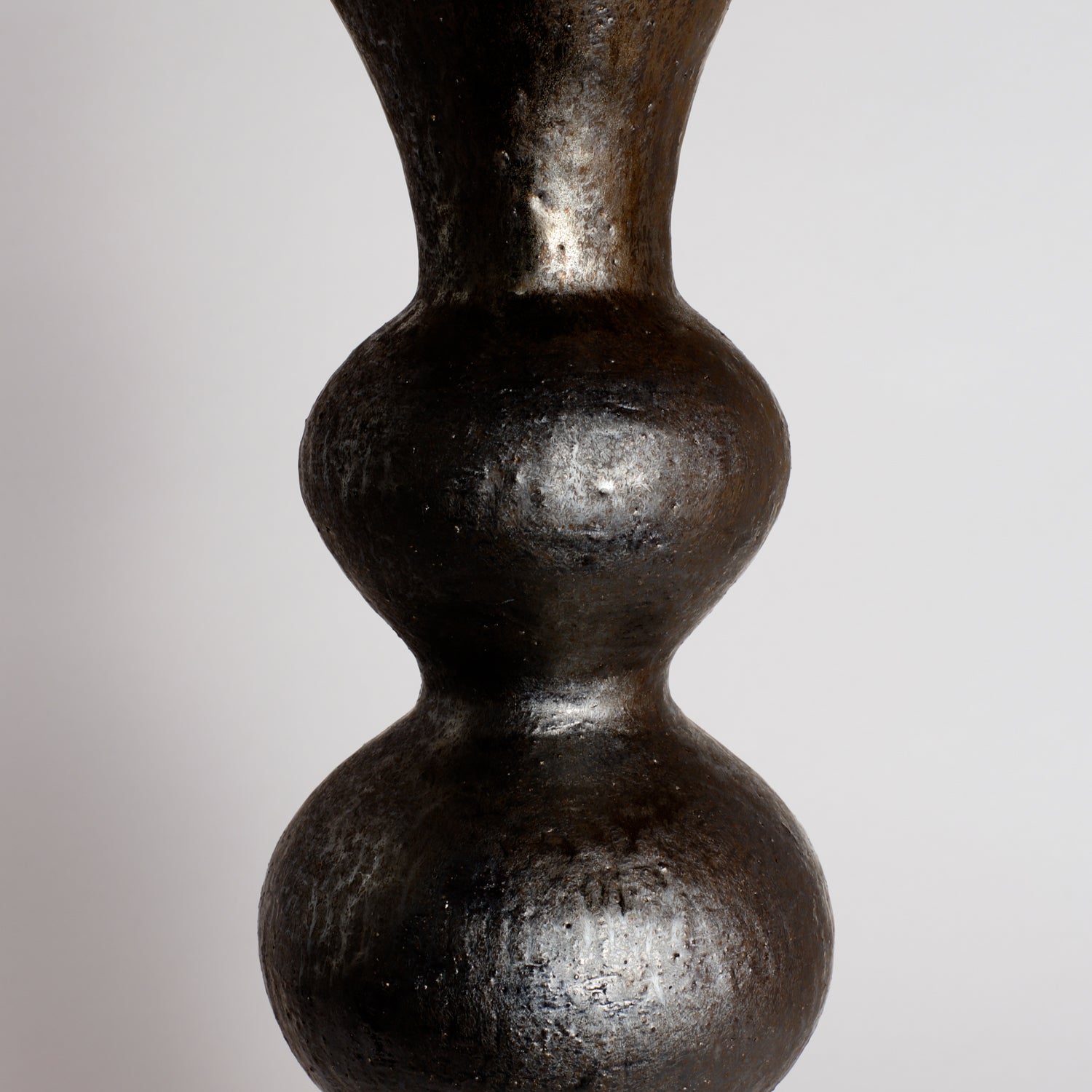 Tall Smooth Bronze Wobble Vessel