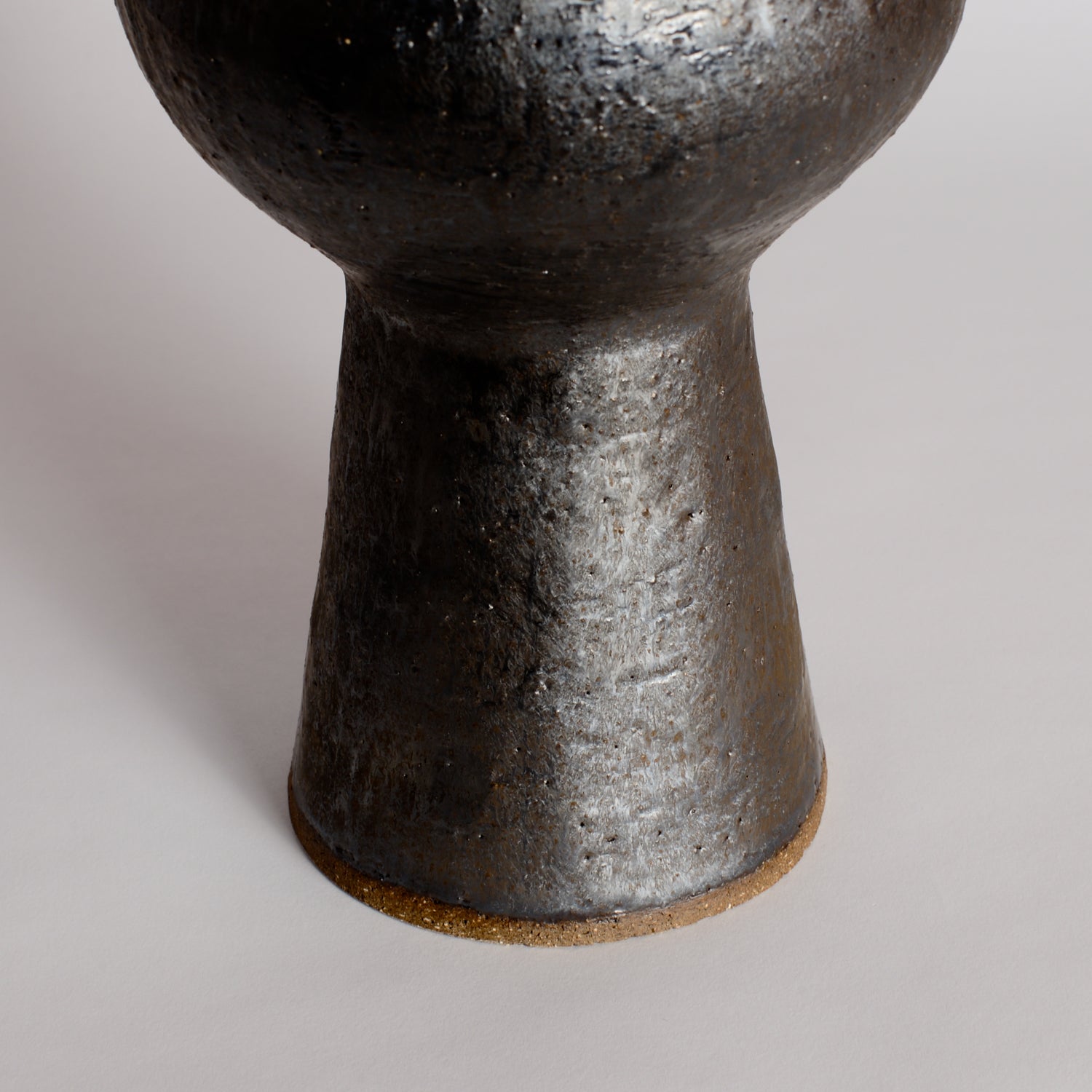 Tall Smooth Bronze Wobble Vessel