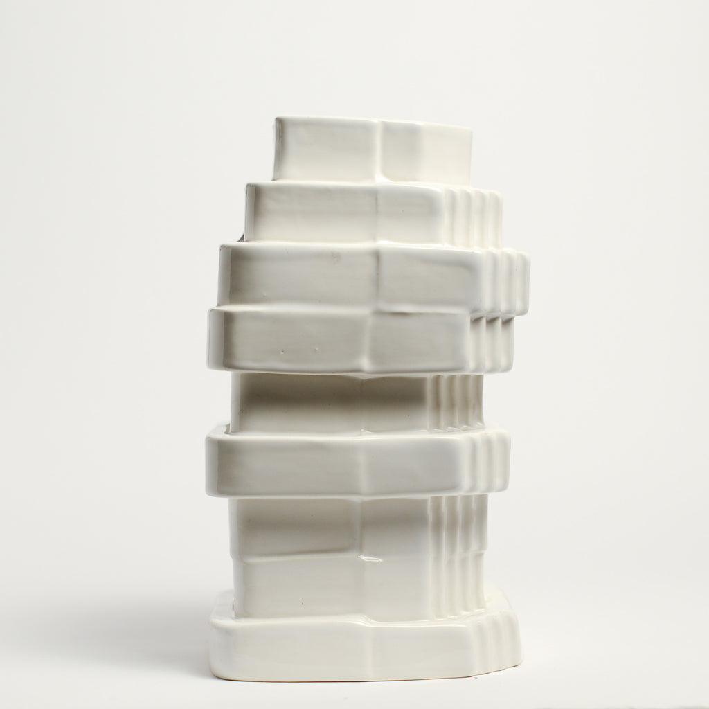 Ceramic vase handmade by Ella Reweti using slipcasting techniques. Ella is an Australian ceramicist based in Melbourne where she creates contemporary ceramics using slipcasting techniques and playing with form.