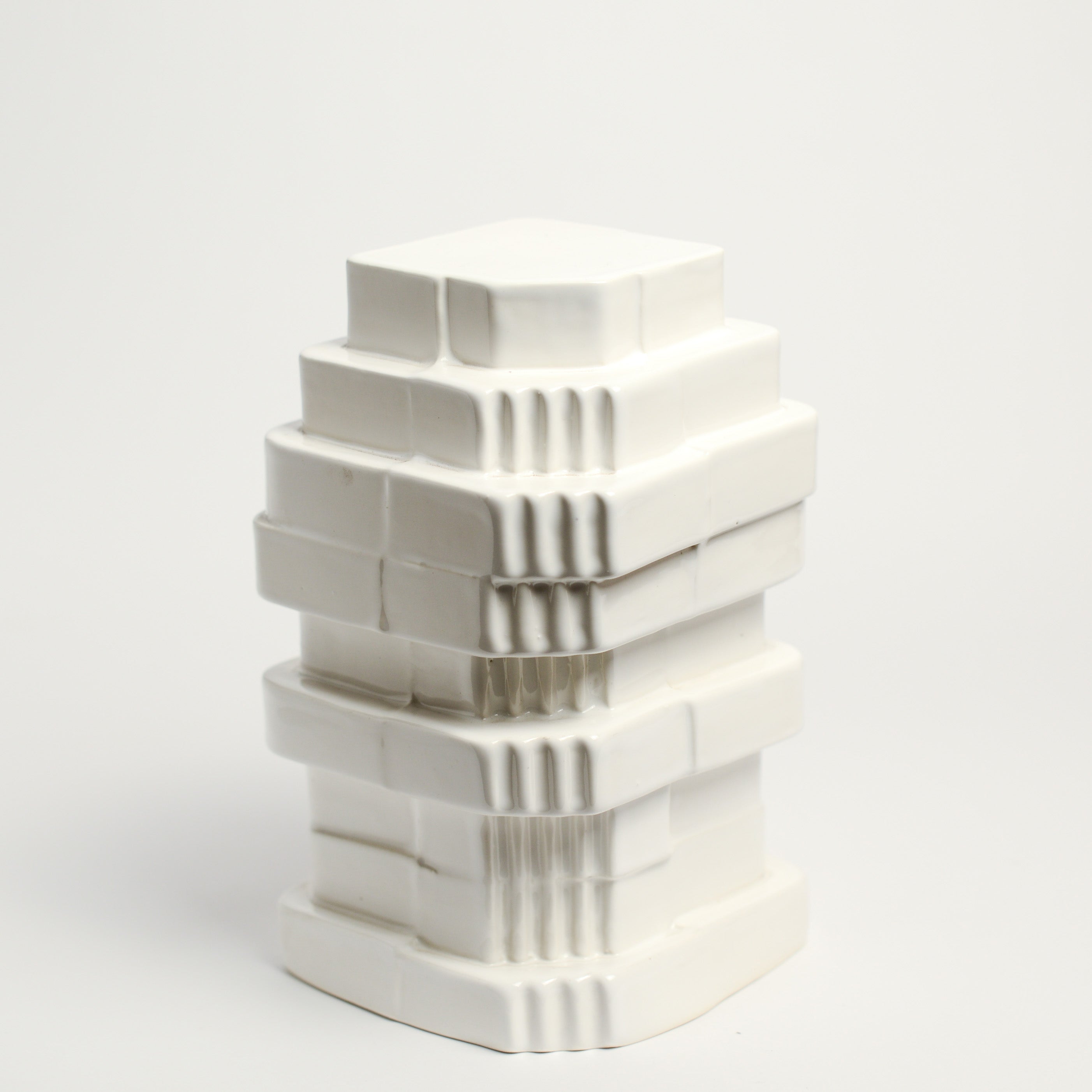 Ceramic vase handmade by Ella Reweti using slipcasting techniques. Ella is an Australian ceramicist based in Melbourne where she creates contemporary ceramics using slipcasting techniques and playing with form.