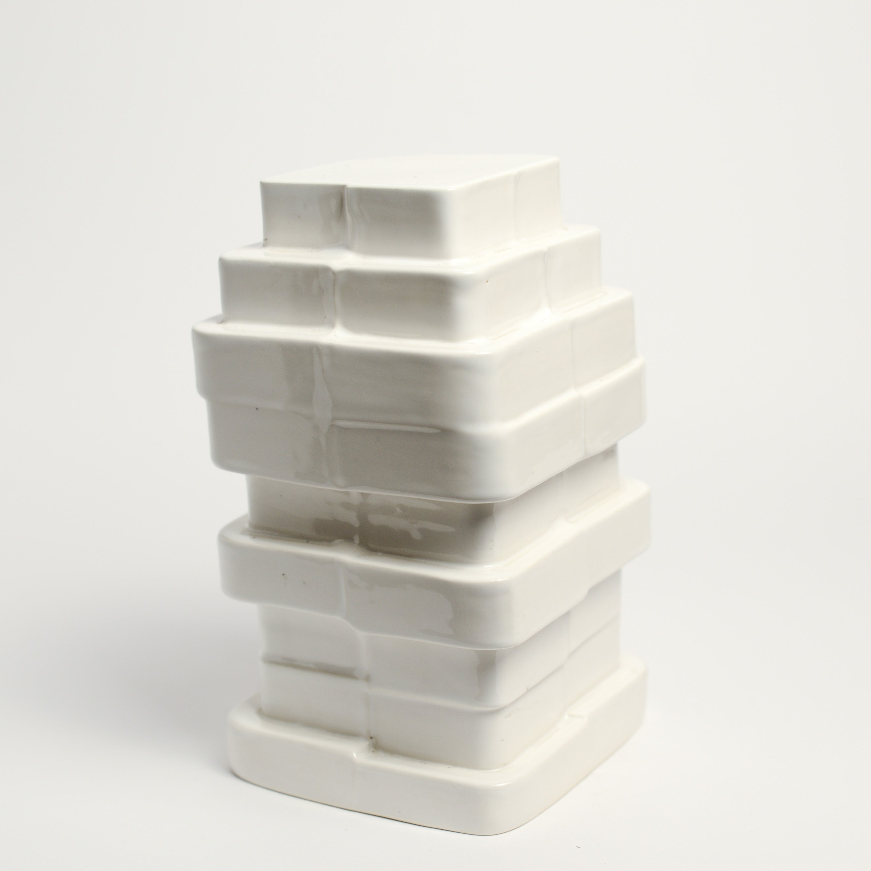 Ceramic vase handmade by Ella Reweti using slipcasting techniques. Ella is an Australian ceramicist based in Melbourne where she creates contemporary ceramics using slipcasting techniques and playing with form.