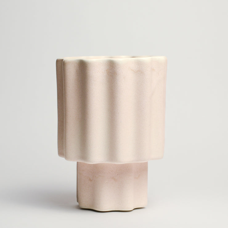 Ceramic vase handmade by Ella Reweti using slipcasting techniques. Ella is an Australian ceramicist based in Melbourne where she creates contemporary ceramics using slipcasting techniques and playing with form.