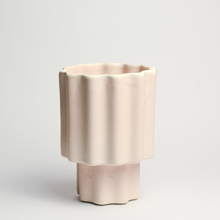 Ceramic vase handmade by Ella Reweti using slipcasting techniques. Ella is an Australian ceramicist based in Melbourne where she creates contemporary ceramics using slipcasting techniques and playing with form.