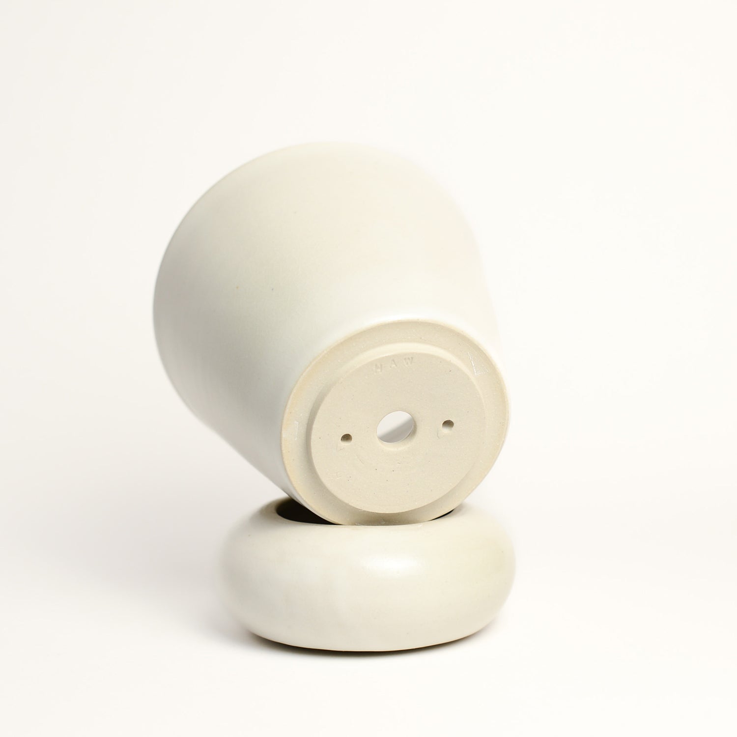 HAYLEY .A. WEST (H A W) is an artist, designer and educator. She has a BA Fine Arts from UNSW COFA and a BA Interior and Spatial Design at UTS. In the last decade, Hayley’s fine art and design background has progressed to a practice centred around ceramics. Working as a technician and artist educator in several ceramics studios whilst also producing a range of functional and exhibition works from her home studio. Her practice has a strong focus on design and the development of glazes.