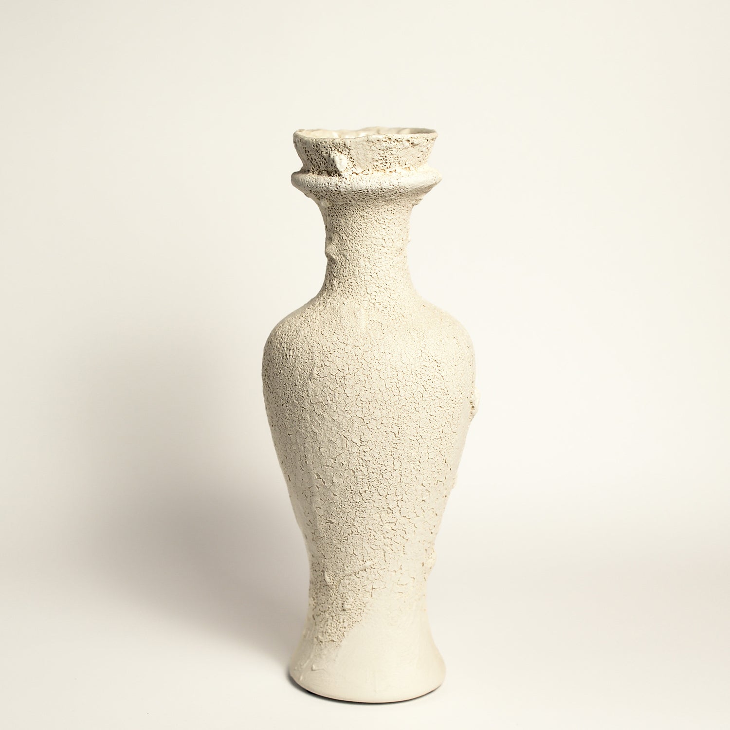 Ceramic vase handmade by Melbourne-based artist Irene from Iggy & Lou Lou. Irene’s practice is informed by a deep respect for traditional making processes, a commitment to a minimal environmental footprint, and a devotion to creating handmade, beloved ceramics that last a lifetime.