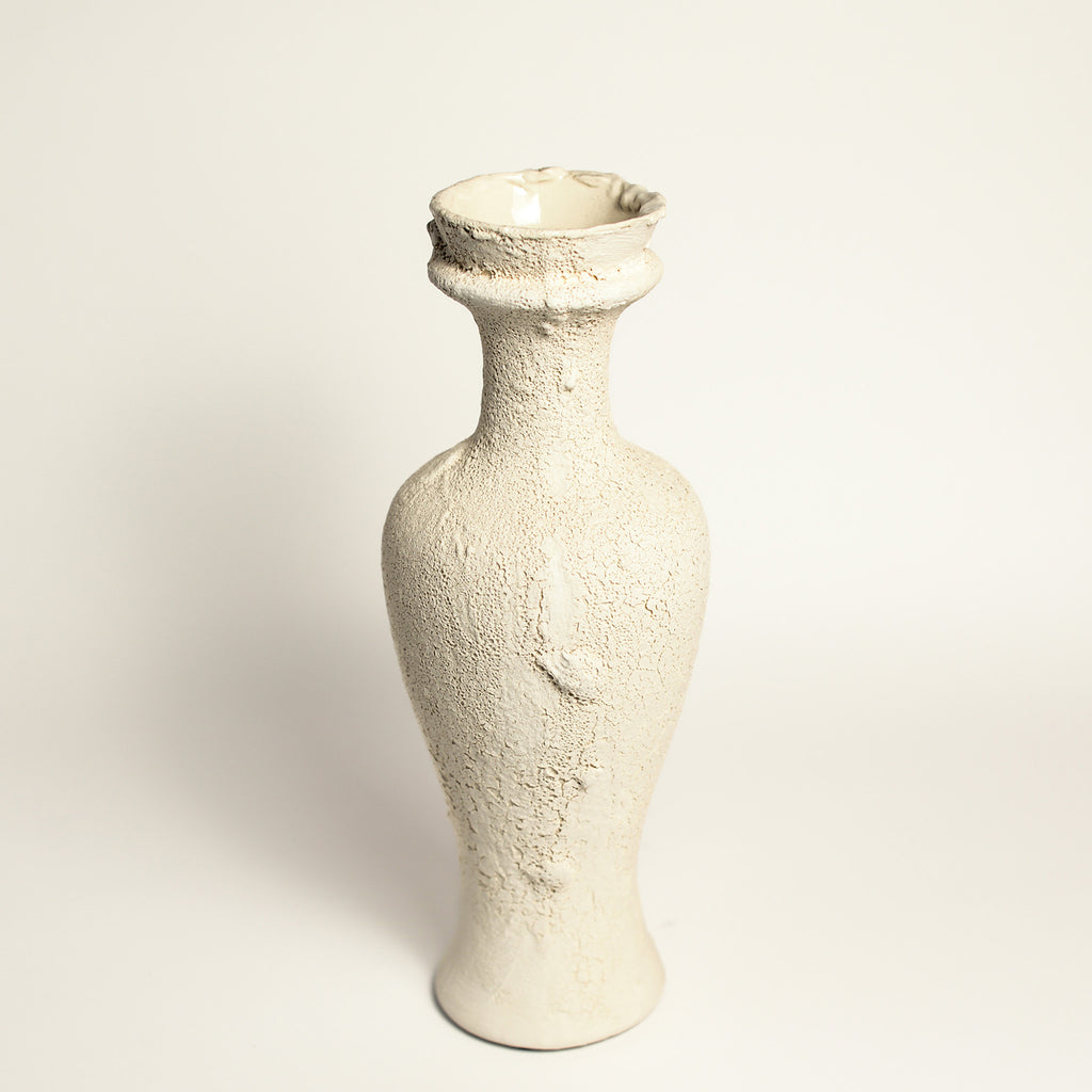 Ceramic vase handmade by Melbourne-based artist Irene from Iggy & Lou Lou. Irene’s practice is informed by a deep respect for traditional making processes, a commitment to a minimal environmental footprint, and a devotion to creating handmade, beloved ceramics that last a lifetime.