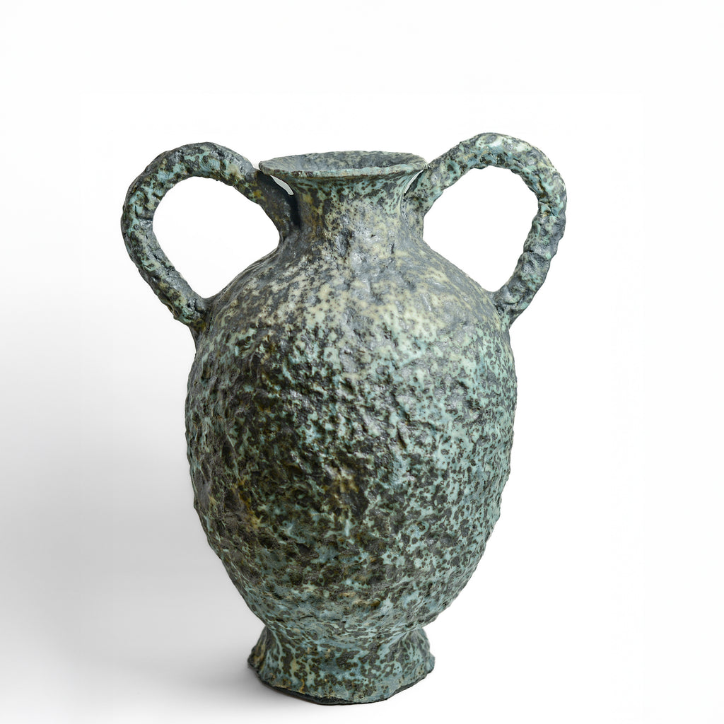 After working in music, advertising and law, KELLY BROWN became a ceramic artist.

Working in Sydney at Kil.n.it, she specialises in crafting timeless pieces inspired by ancient forms, huge urns being her favourite. Collaborating with interior designers, her creations bring sophistication and a touch of history to living spaces. Through unique partnerships with painters, she breaks traditional boundaries, creating captivating expressions.