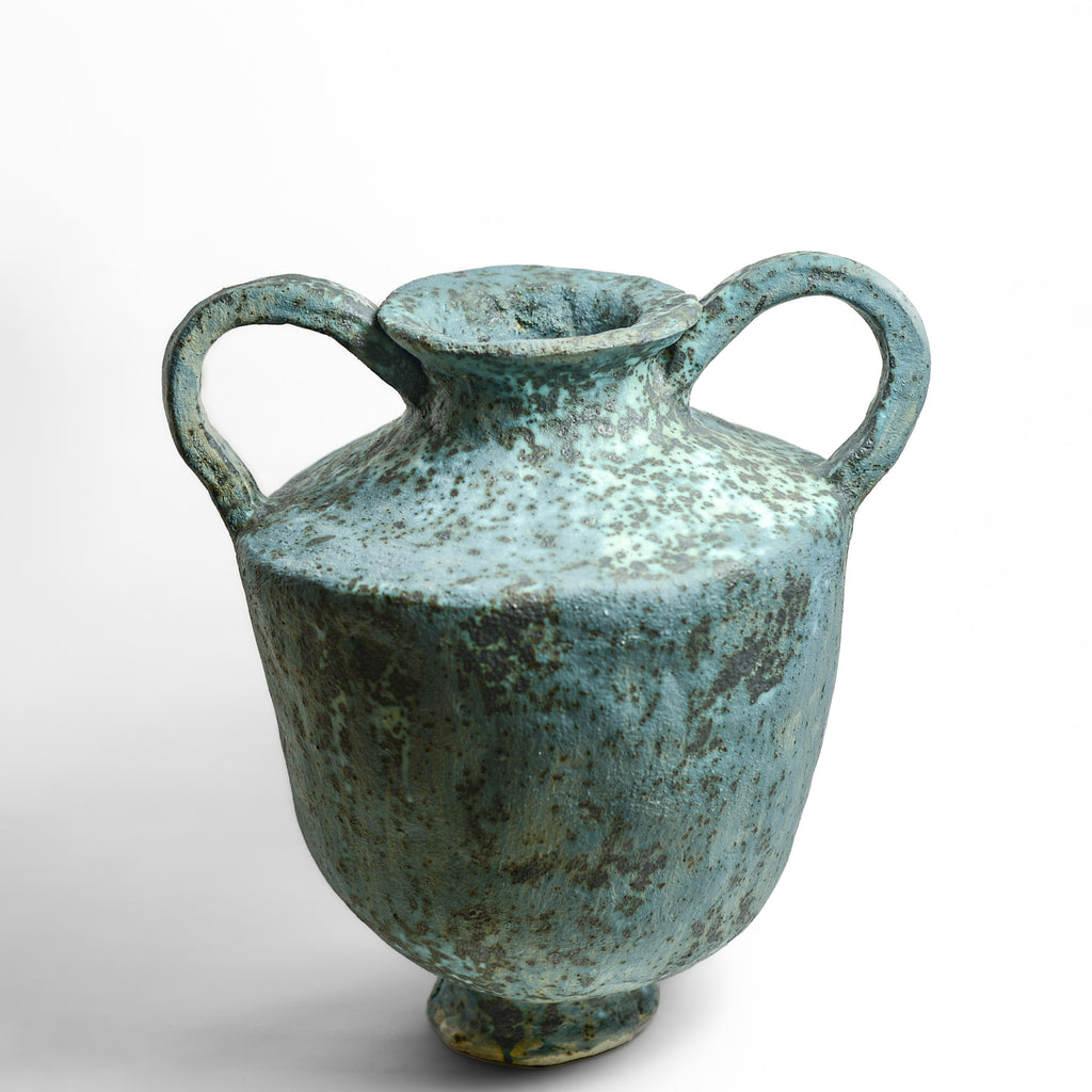 After working in music, advertising and law, KELLY BROWN became a ceramic artist.

Working in Sydney at Kil.n.it, she specialises in crafting timeless pieces inspired by ancient forms, huge urns being her favourite. Collaborating with interior designers, her creations bring sophistication and a touch of history to living spaces. Through unique partnerships with painters, she breaks traditional boundaries, creating captivating expressions.