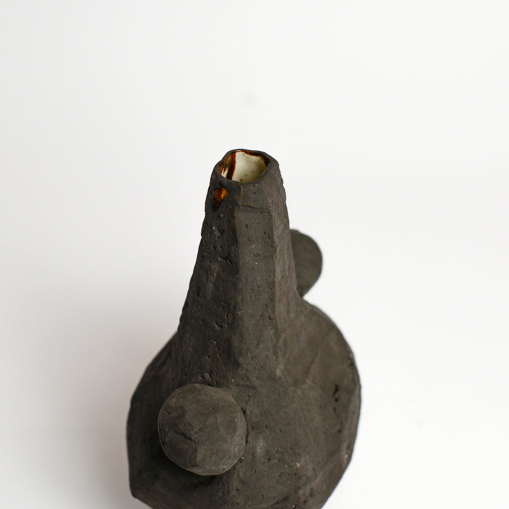 Ceramic sculpture handmade by Kirsten Perry using slipcasting techniques and homemade glaze recipes. Kirsten is an Australian ceramicist based in Melbourne where she creates contemporary ceramics using slipcasting techniques and playing with texture.