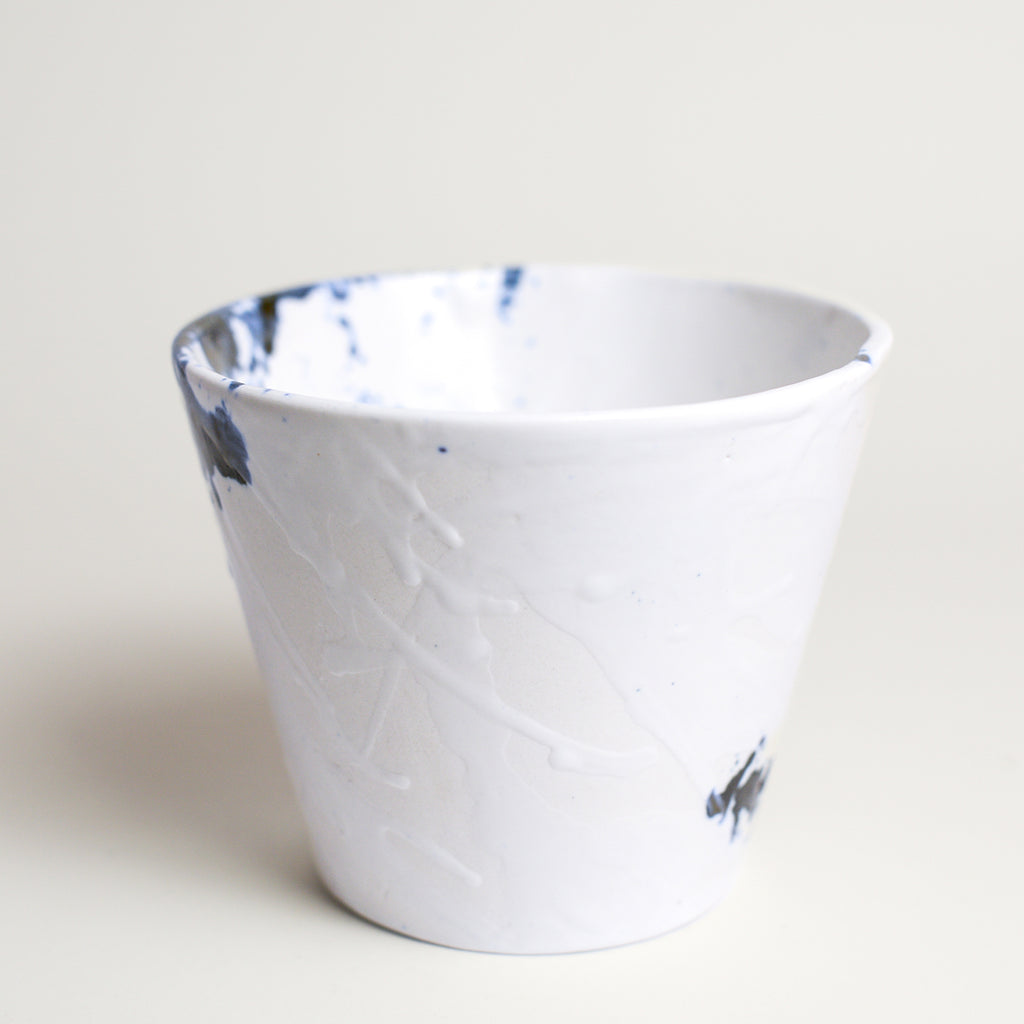 Porcelain vase handmade by Melbourne-based ceramicist Lucile Sciallano from La Petite Fabrique De Brunswick. Originally from France, Lucile now works from her Brunswick garden shed where she creates a variety of tableware using slip cast techniques and hand-painted patterns.