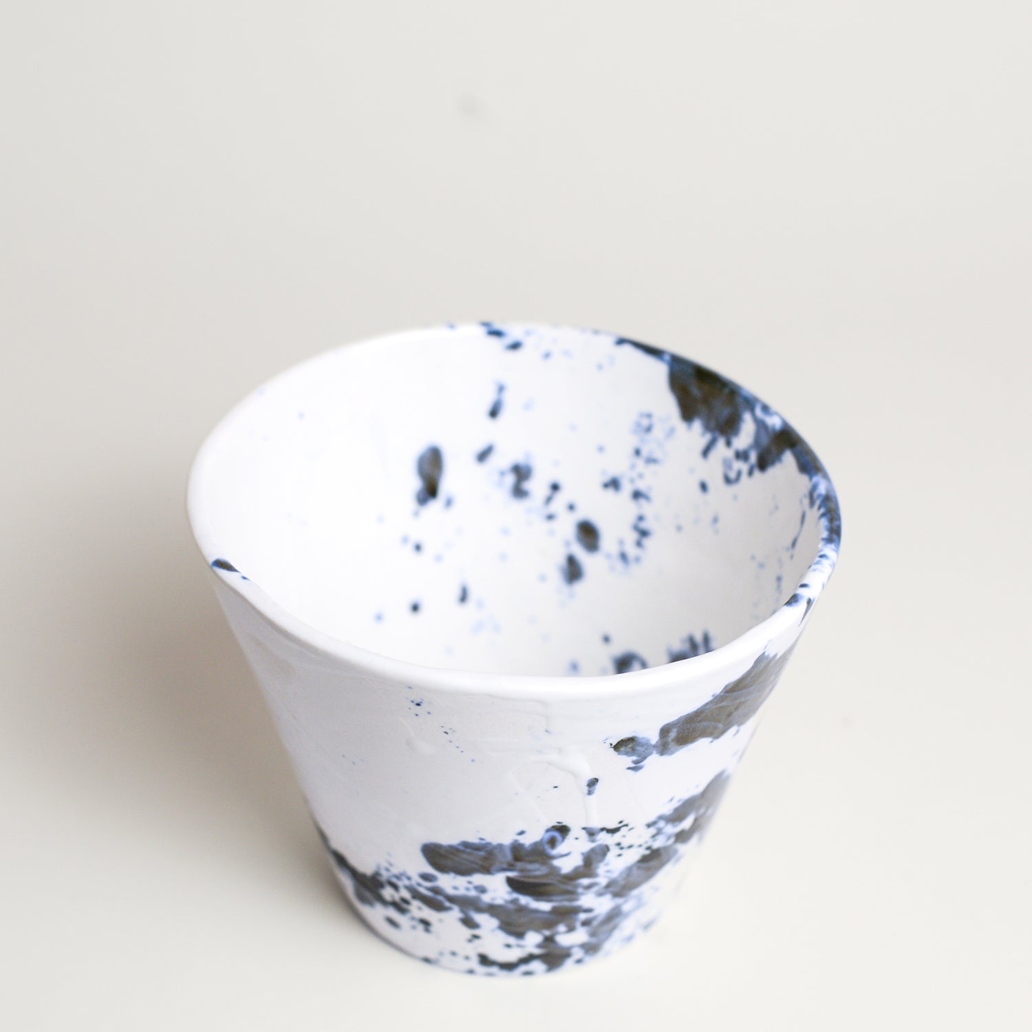 Porcelain vase handmade by Melbourne-based ceramicist Lucile Sciallano from La Petite Fabrique De Brunswick. Originally from France, Lucile now works from her Brunswick garden shed where she creates a variety of tableware using slip cast techniques and hand-painted patterns.