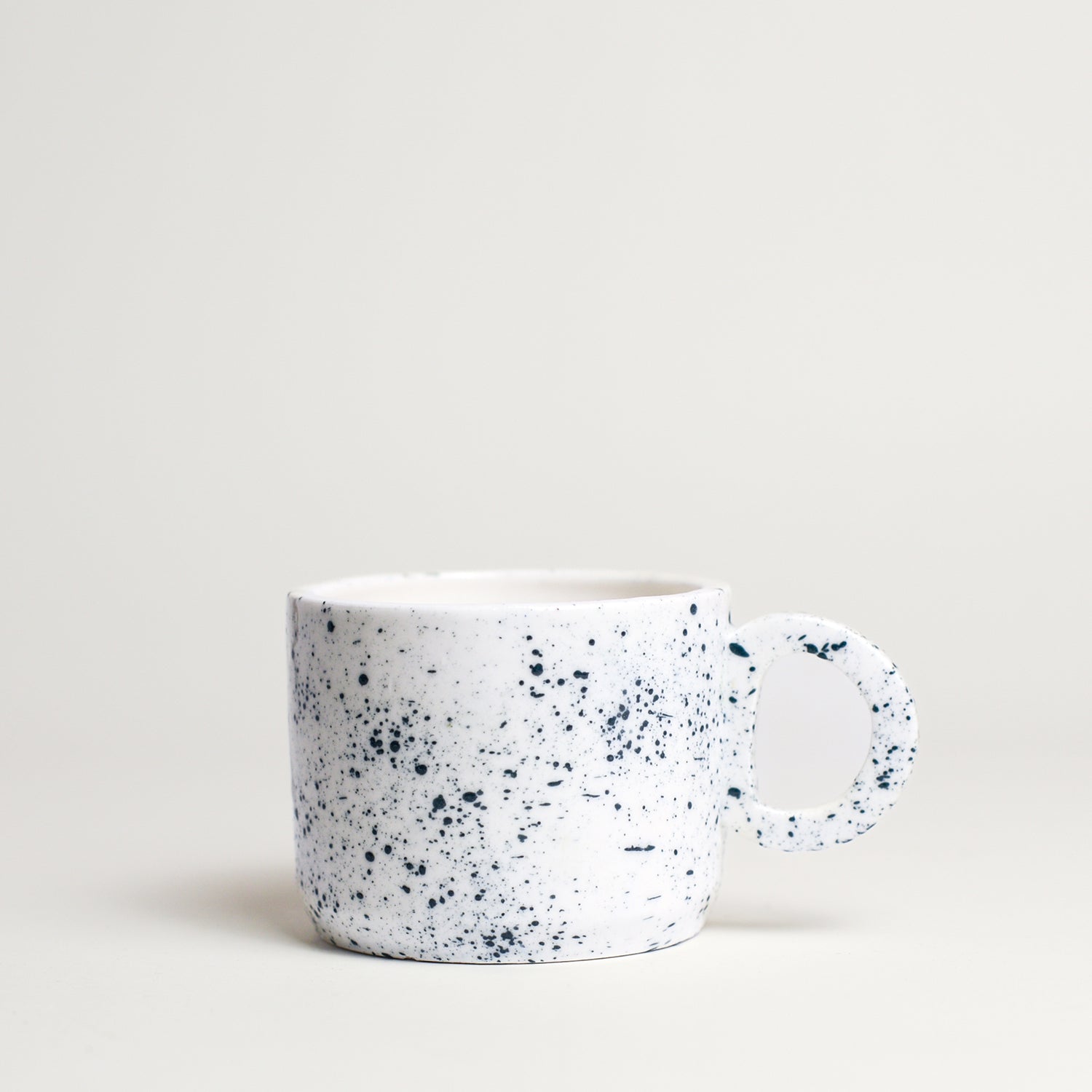 Porcelain Asymmetrical breakfast Bowl handmade by Melbourne-based ceramicist Lucile Sciallano from La Petite Fabrique De Brunswick. Originally from France, Lucile now works from her Brunswick garden shed where she creates a variety of tableware using slip cast techniques and hand-painted patterns.