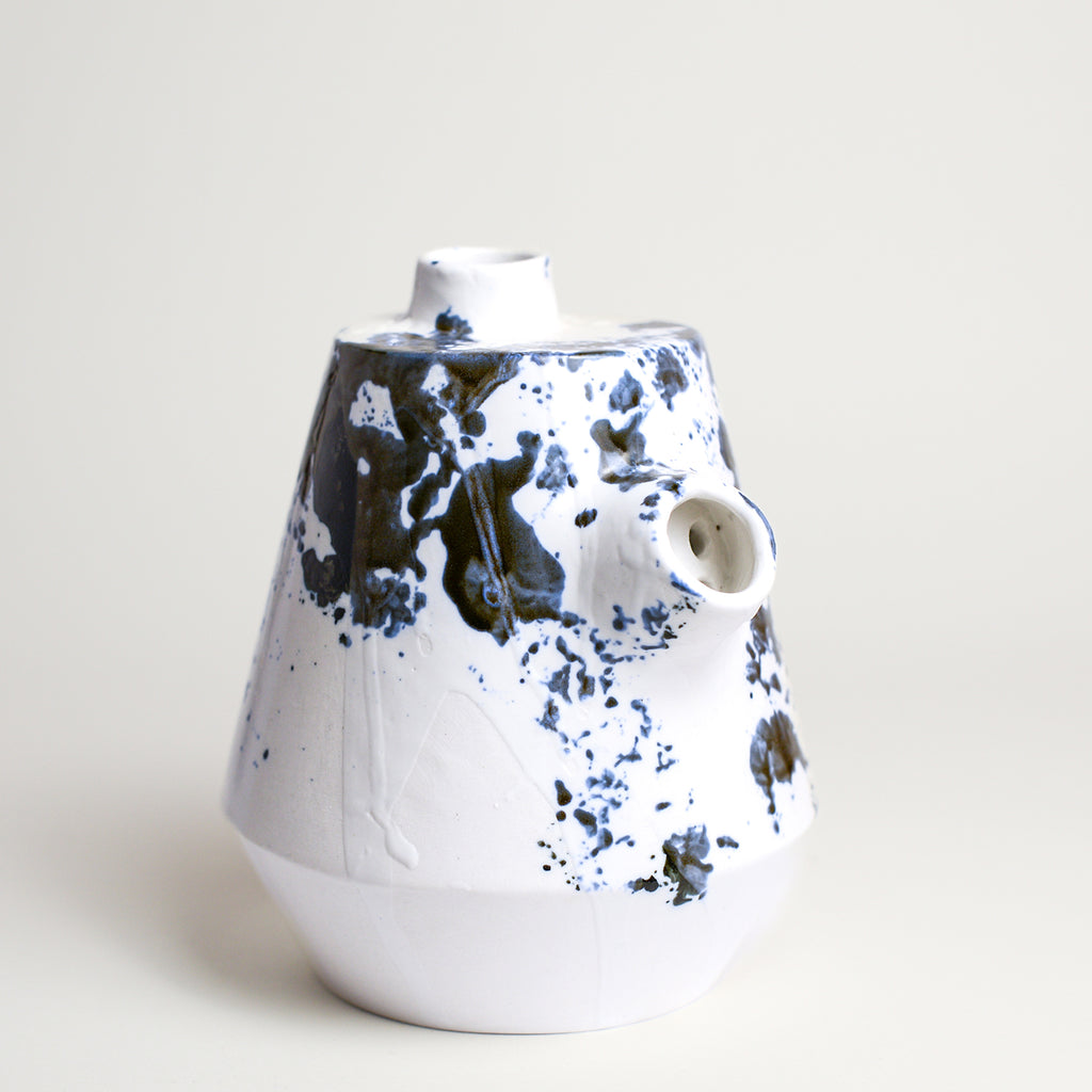 Porcelain vase handmade by Melbourne-based ceramicist Lucile Sciallano from La Petite Fabrique De Brunswick. Originally from France, Lucile now works from her Brunswick garden shed where she creates a variety of tableware using slip cast techniques and hand-painted patterns.