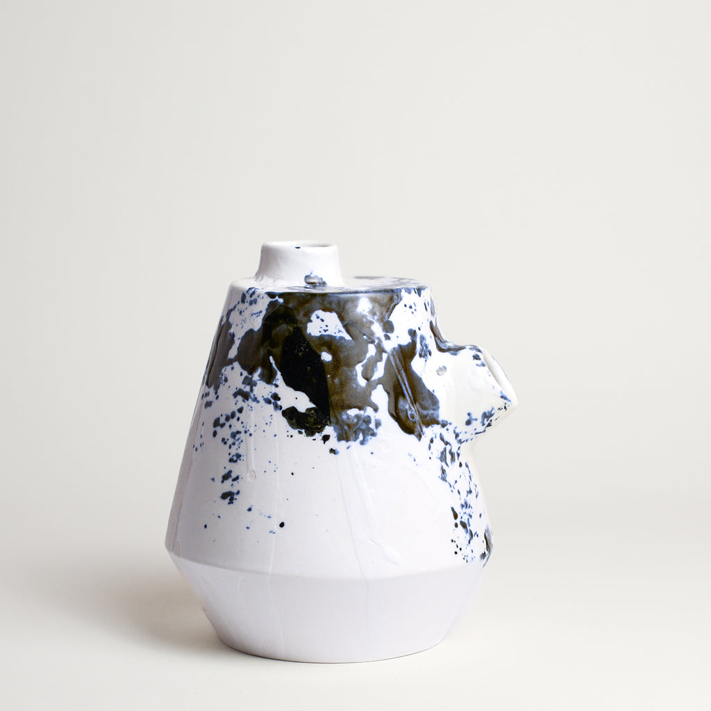 Porcelain vase handmade by Melbourne-based ceramicist Lucile Sciallano from La Petite Fabrique De Brunswick. Originally from France, Lucile now works from her Brunswick garden shed where she creates a variety of tableware using slip cast techniques and hand-painted patterns.