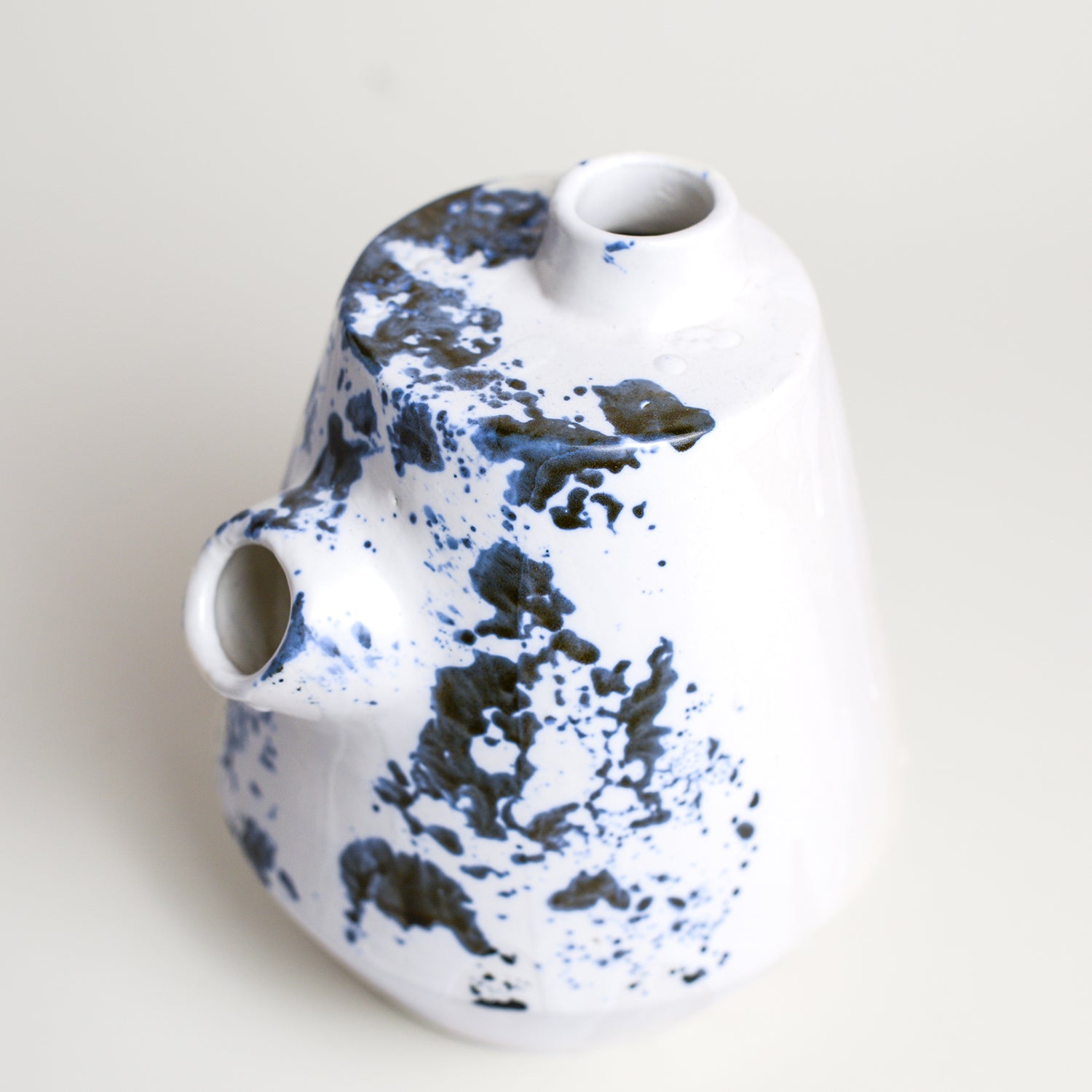 Porcelain vase handmade by Melbourne-based ceramicist Lucile Sciallano from La Petite Fabrique De Brunswick. Originally from France, Lucile now works from her Brunswick garden shed where she creates a variety of tableware using slip cast techniques and hand-painted patterns.