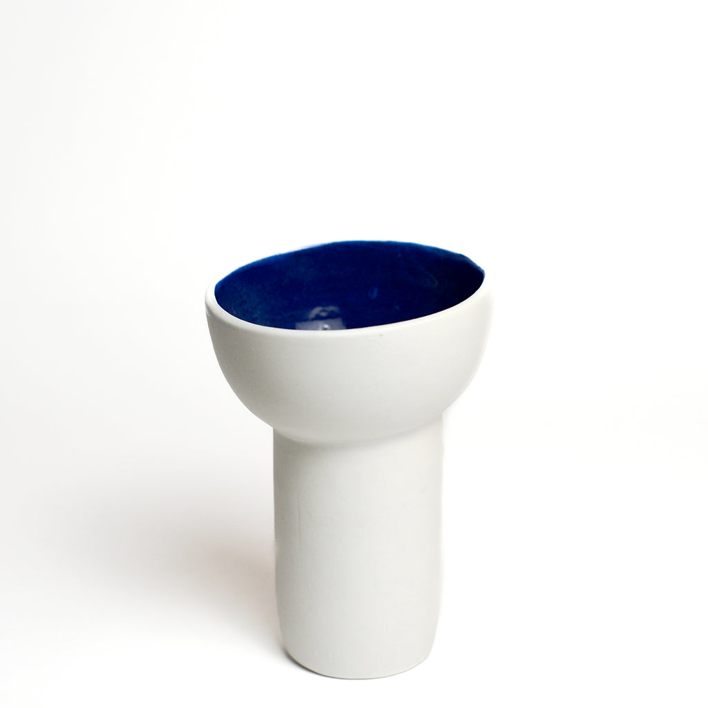 Porcelain vase handmade by Melbourne-based ceramicist Lucile Sciallano from La Petite Fabrique De Brunswick. Originally from France, Lucile now works from her Brunswick garden shed where she creates a variety of tableware using slip cast techniques and hand-painted patterns.