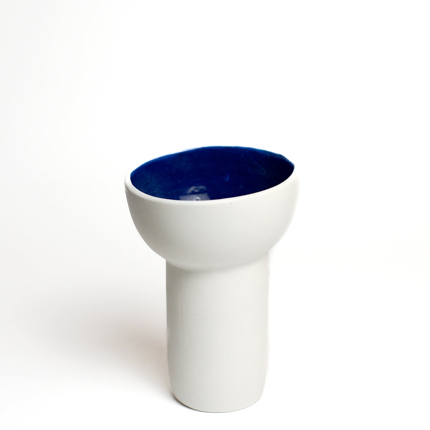 Porcelain vase handmade by Melbourne-based ceramicist Lucile Sciallano from La Petite Fabrique De Brunswick. Originally from France, Lucile now works from her Brunswick garden shed where she creates a variety of tableware using slip cast techniques and hand-painted patterns.