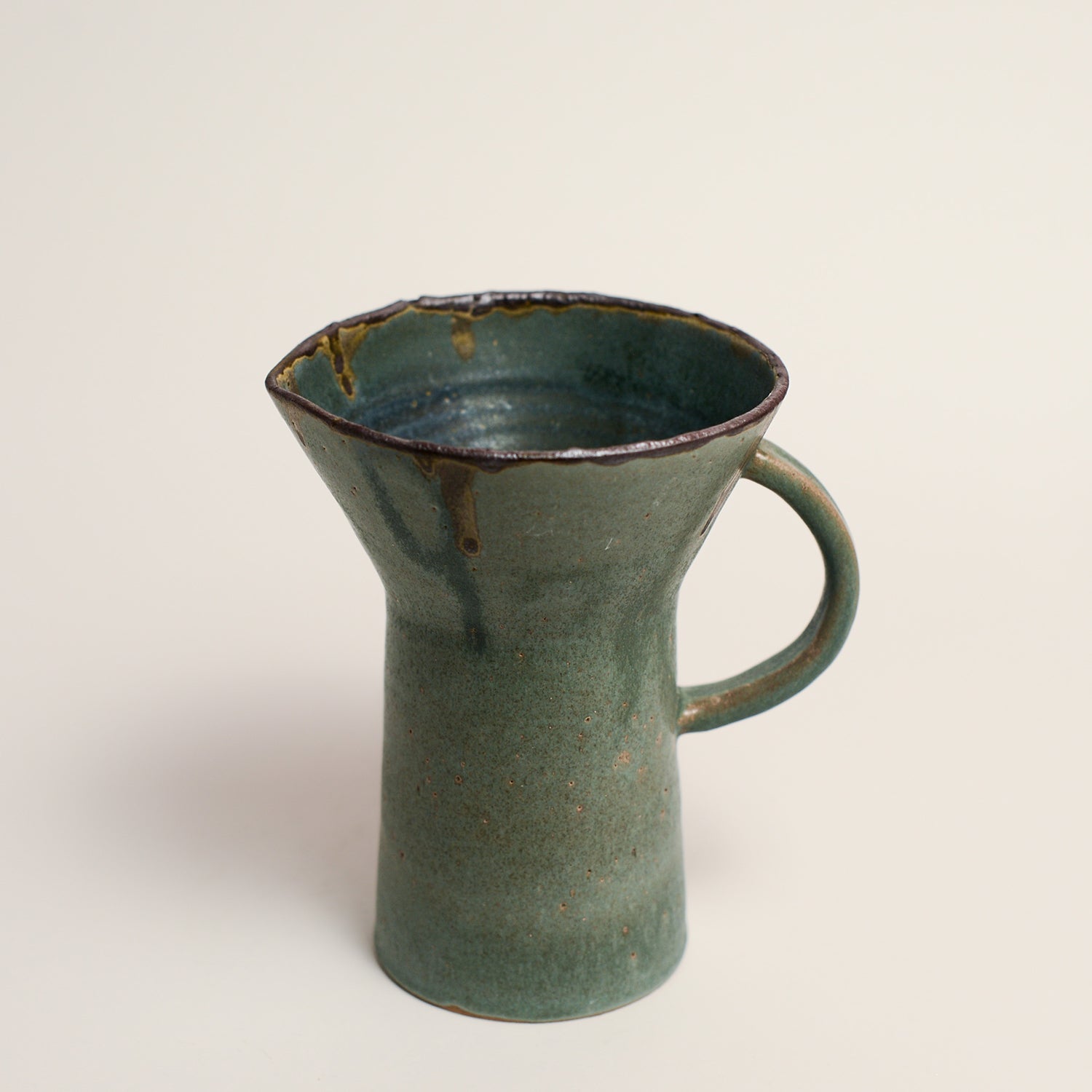 LAURA VELEFF has been making ceramic work for her label LEAF AND THREAD for the past 9 years. Laura works predominantly on the wheel and creates pieces that are imbued with her deep respect and love for natural materials.  Since moving from Melbourne to the Central Victorian Goldfields, Laura's more recent work tells the story of the complex narrative and history of her new surroundings, often incorporating materials she gathers from the environment.