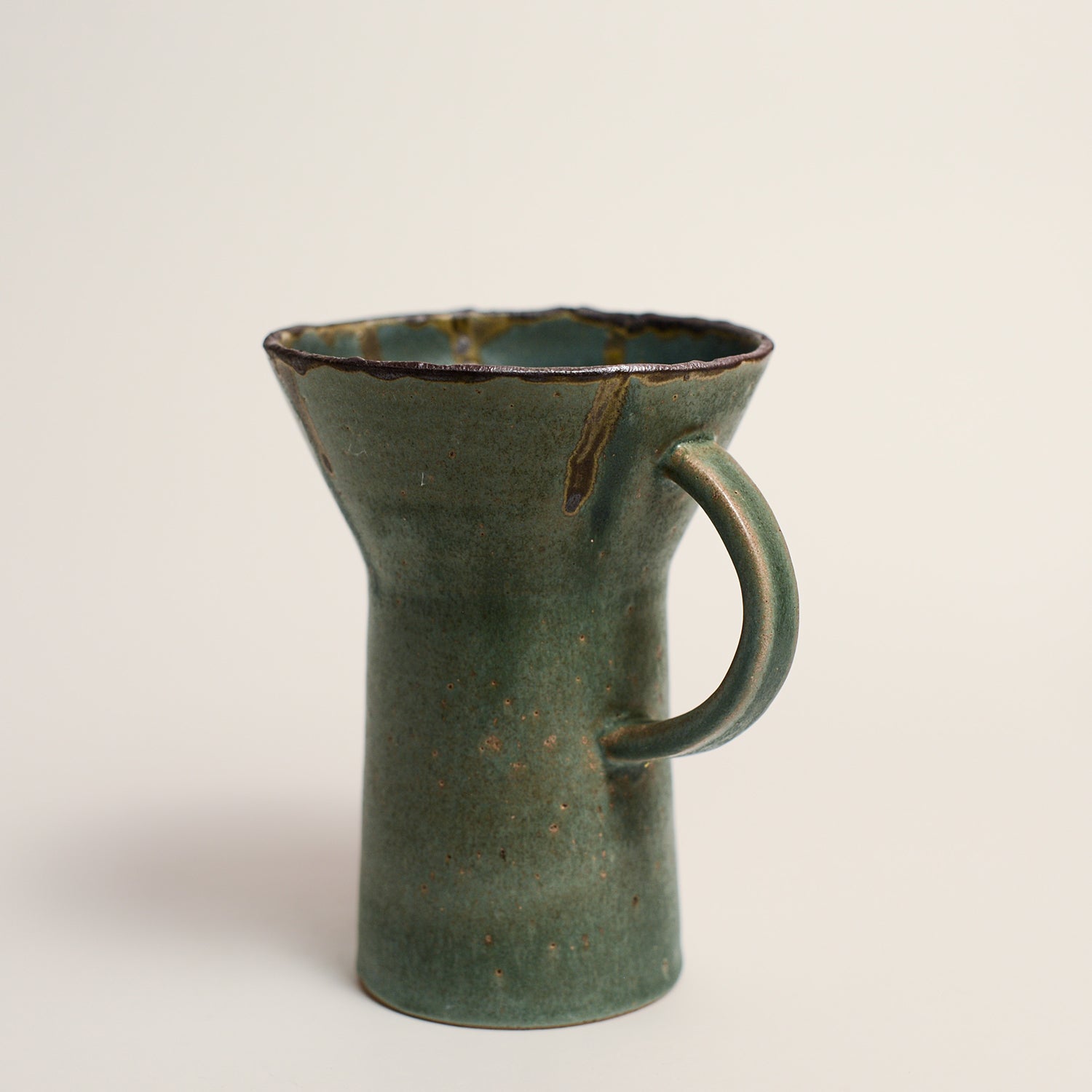 LAURA VELEFF has been making ceramic work for her label LEAF AND THREAD for the past 9 years. Laura works predominantly on the wheel and creates pieces that are imbued with her deep respect and love for natural materials.  Since moving from Melbourne to the Central Victorian Goldfields, Laura's more recent work tells the story of the complex narrative and history of her new surroundings, often incorporating materials she gathers from the environment.