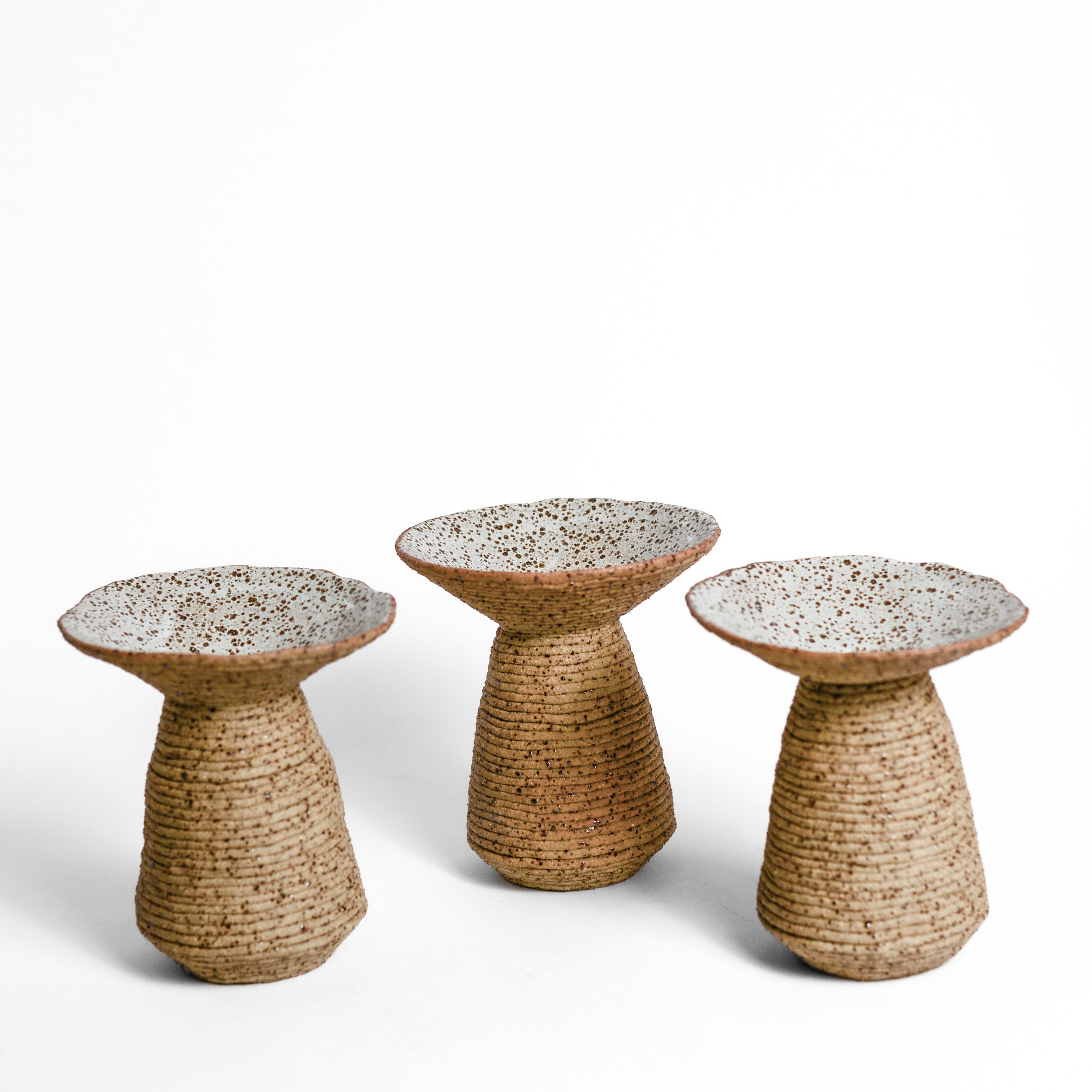 Ceramic vessel handmade by Mali Taylor, a Melbourne based ceramic artist currently exploring the parameters of coil methodology within her practice.