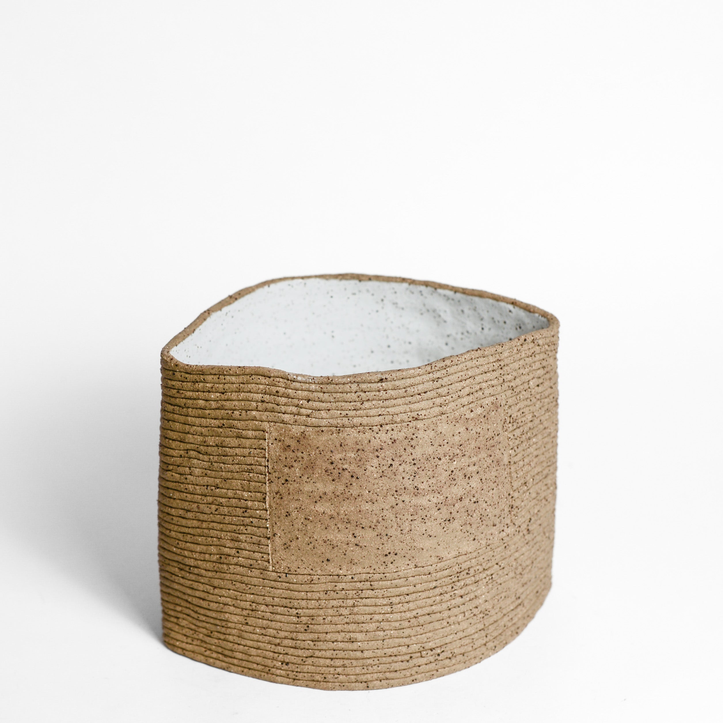 Ceramic vessel handmade by Mali Taylor, a Melbourne based ceramic artist currently exploring the parameters of coil methodology within her practice.