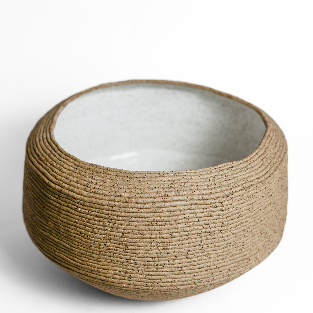 Ceramic vessel handmade by Mali Taylor, a Melbourne based ceramic artist currently exploring the parameters of coil methodology within her practice.