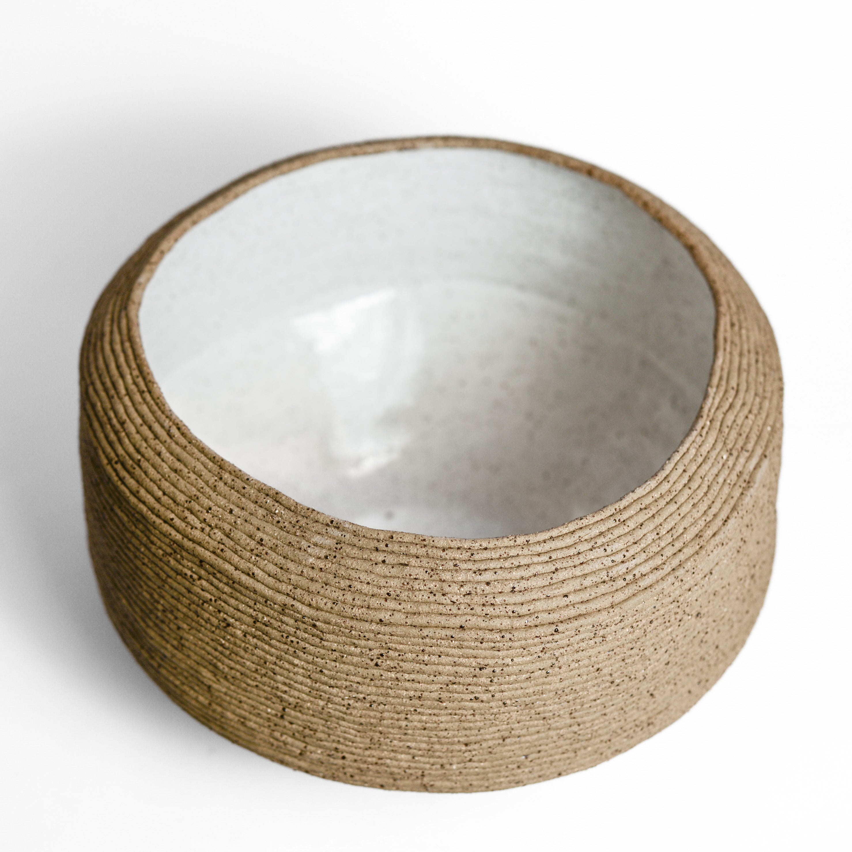 Ceramic vessel handmade by Mali Taylor, a Melbourne based ceramic artist currently exploring the parameters of coil methodology within her practice.